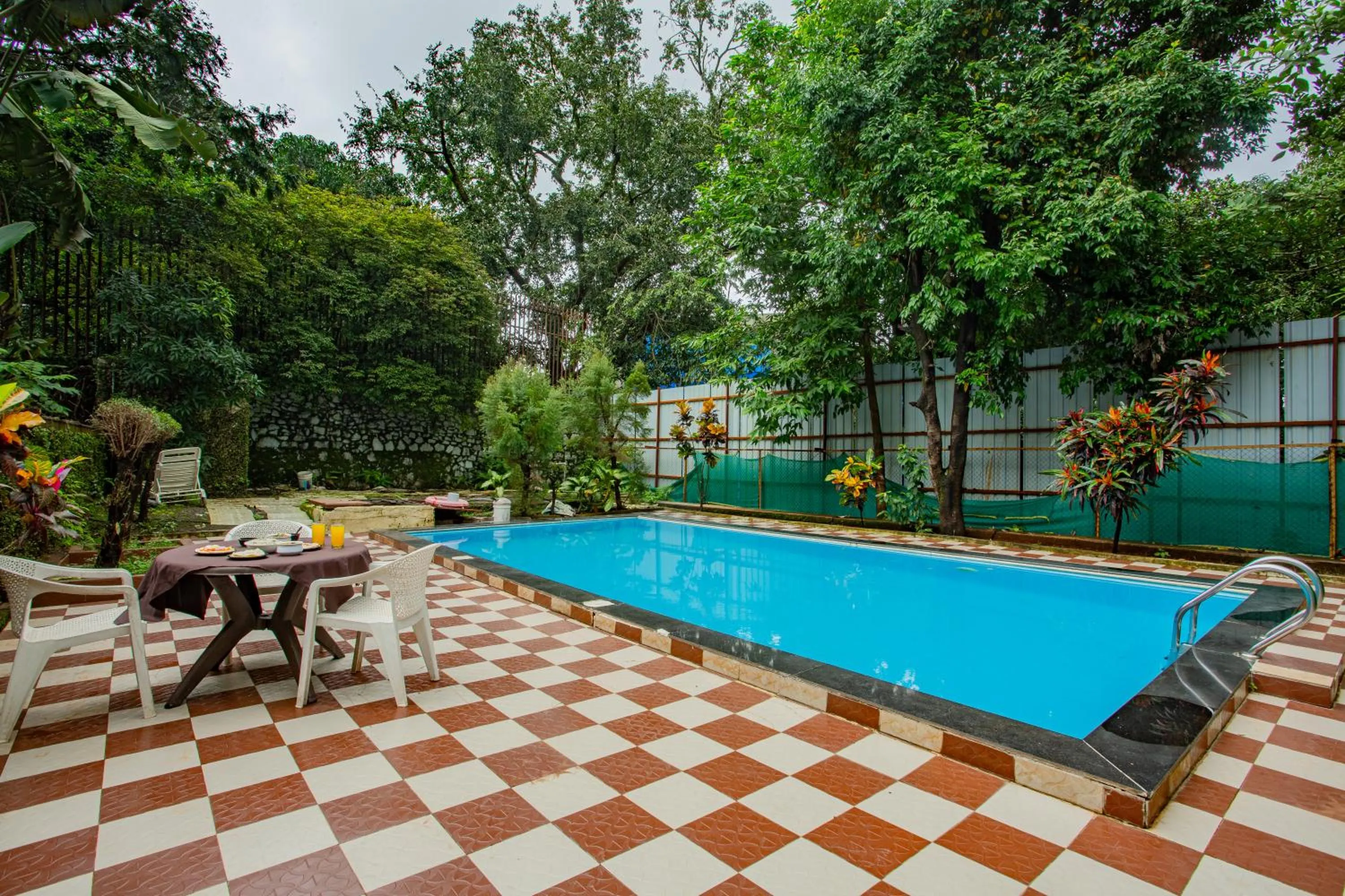 Swimming pool in Hilltop suites by 29 bungalow