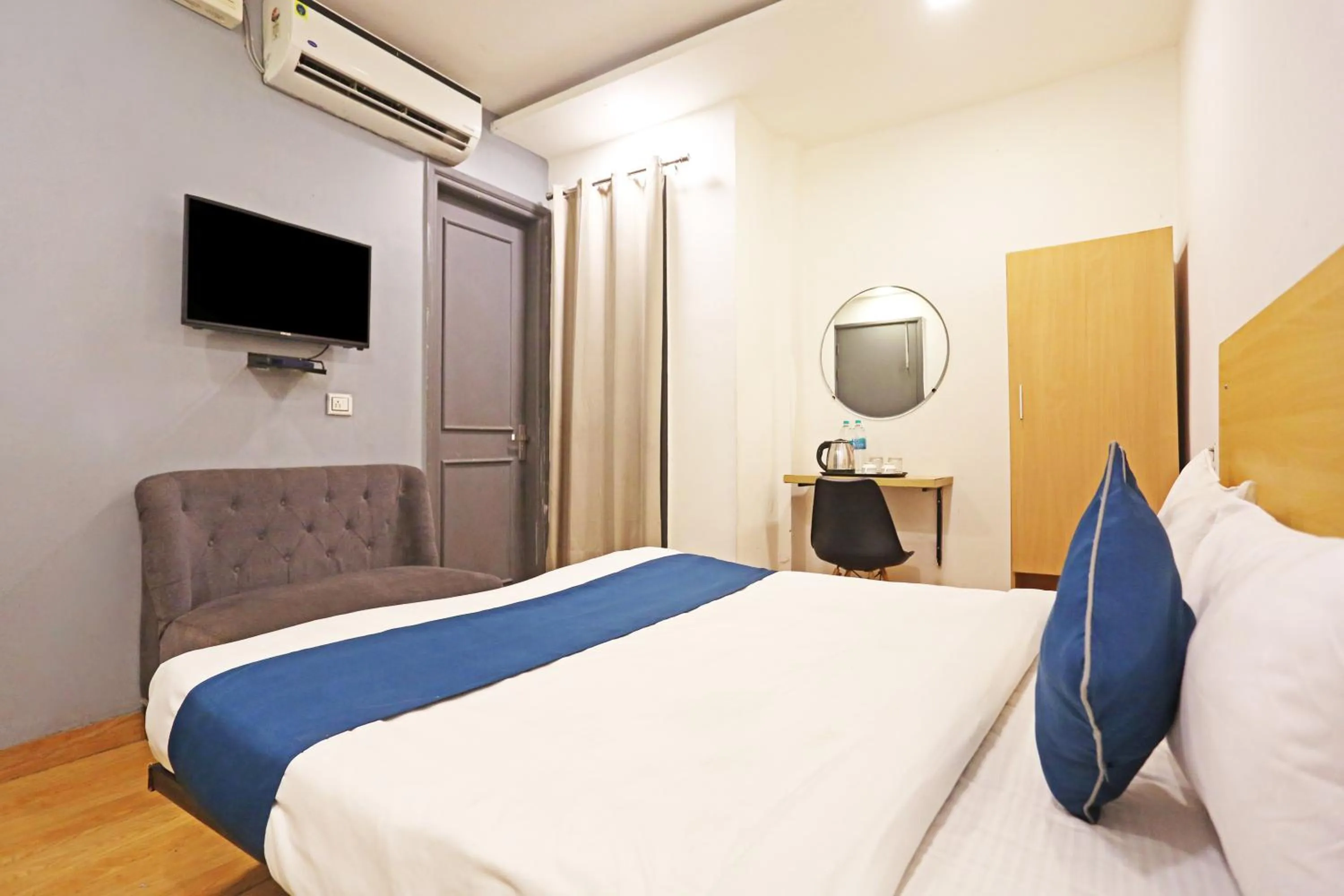 Photo of the whole room, Bed in Hotel Raaso Inn Rohini Sec-16