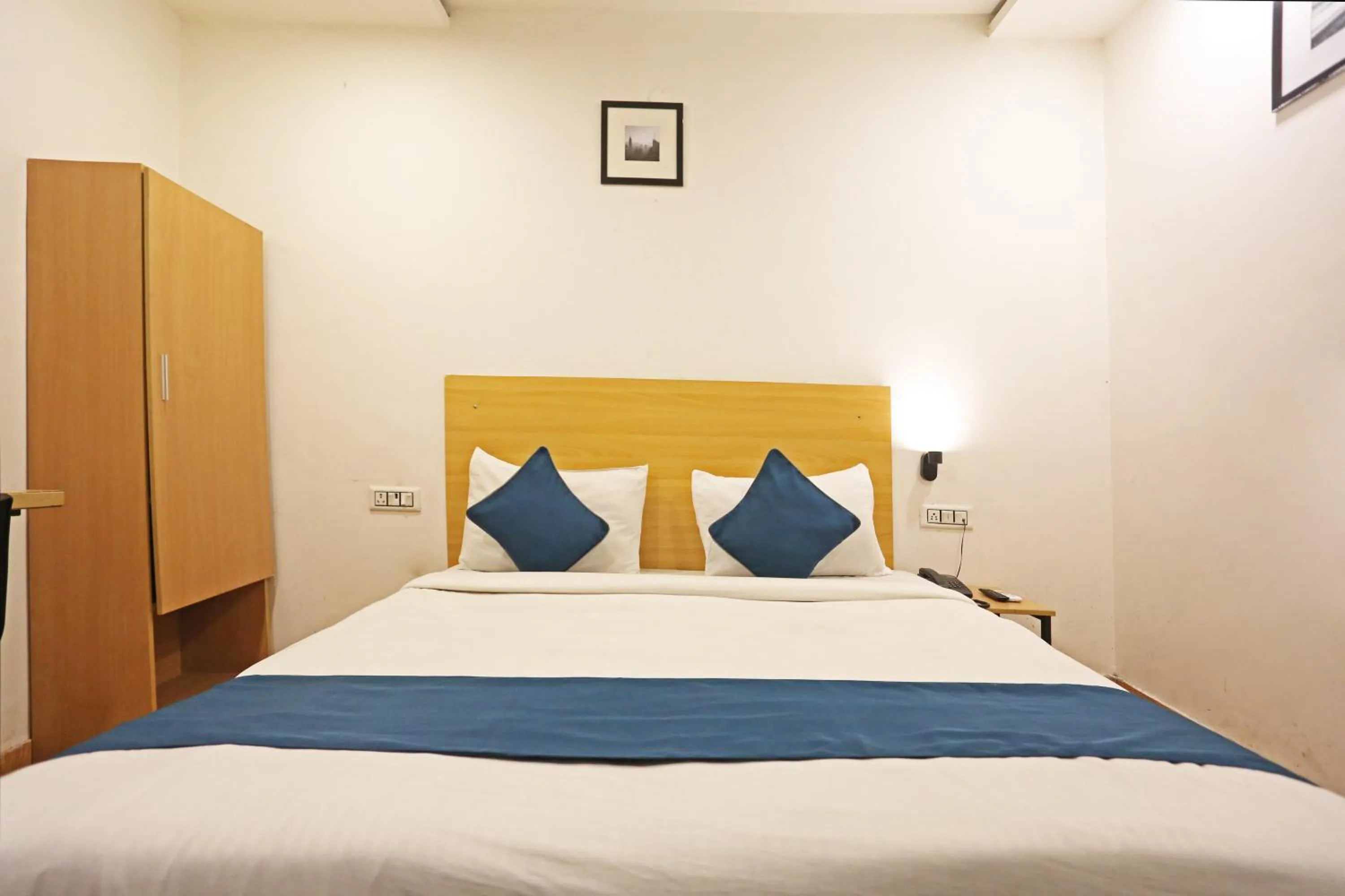 Photo of the whole room, Bed in Hotel Raaso Inn Rohini Sec-16