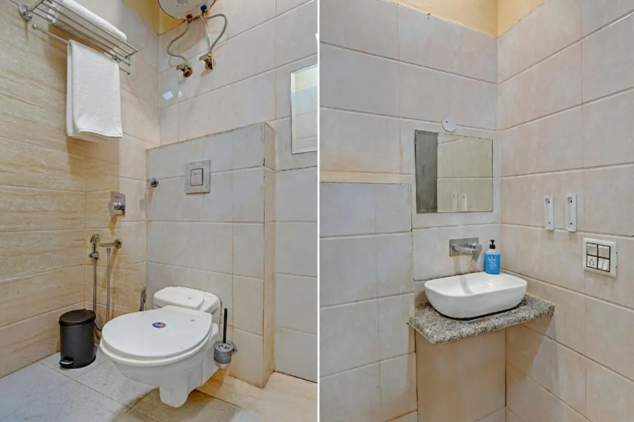 Shower in Hotel Raaso Inn Rohini I Near Metro I Couple Friendly I Spacious Rooms I Budget Stay