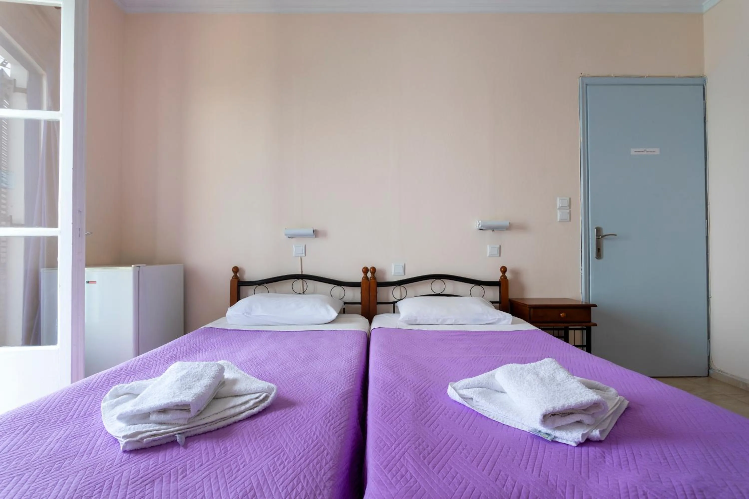 Bed in Stelios Hotel