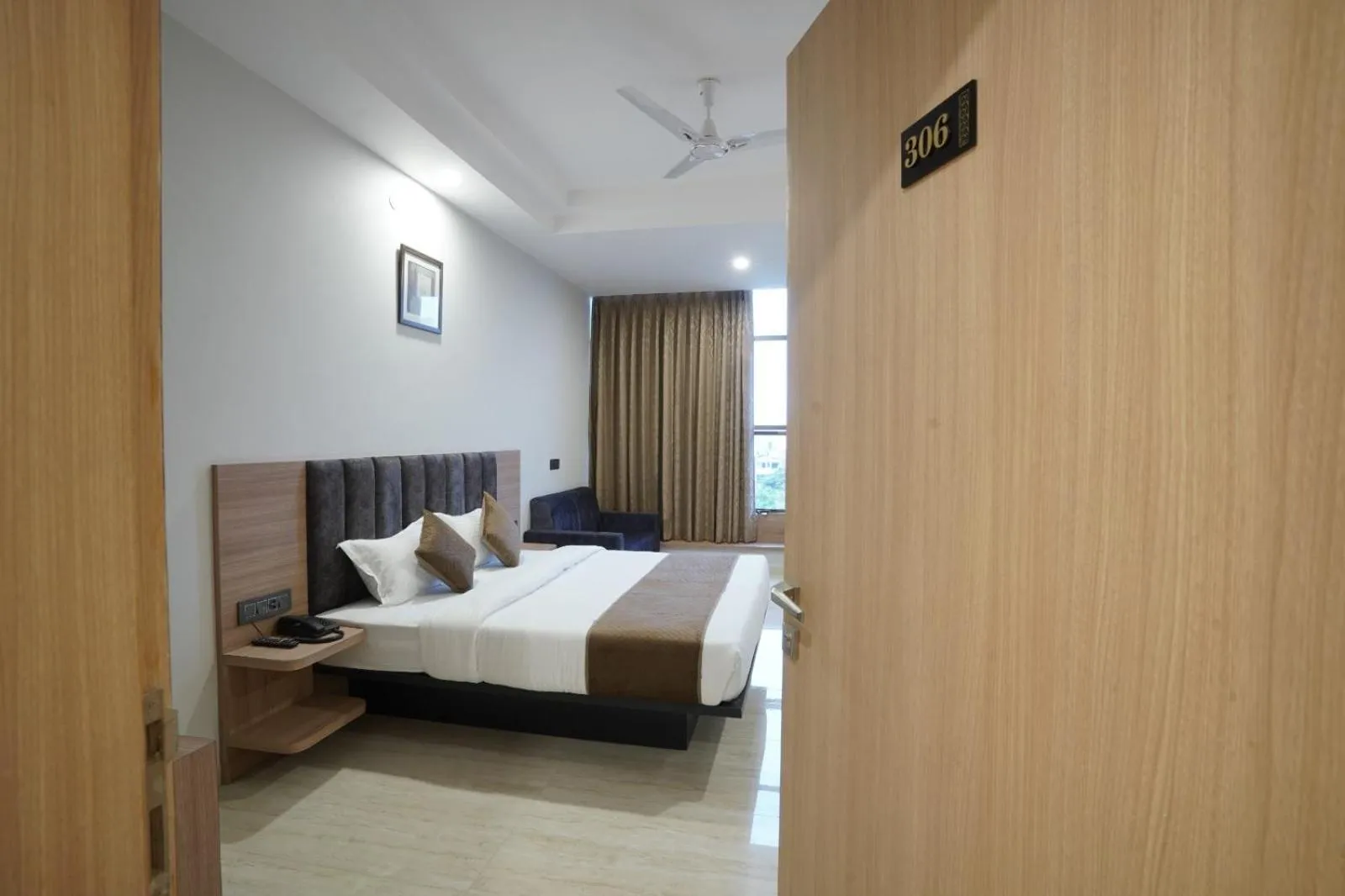 Photo of the whole room, Bed in Hotel Krishna Inn
