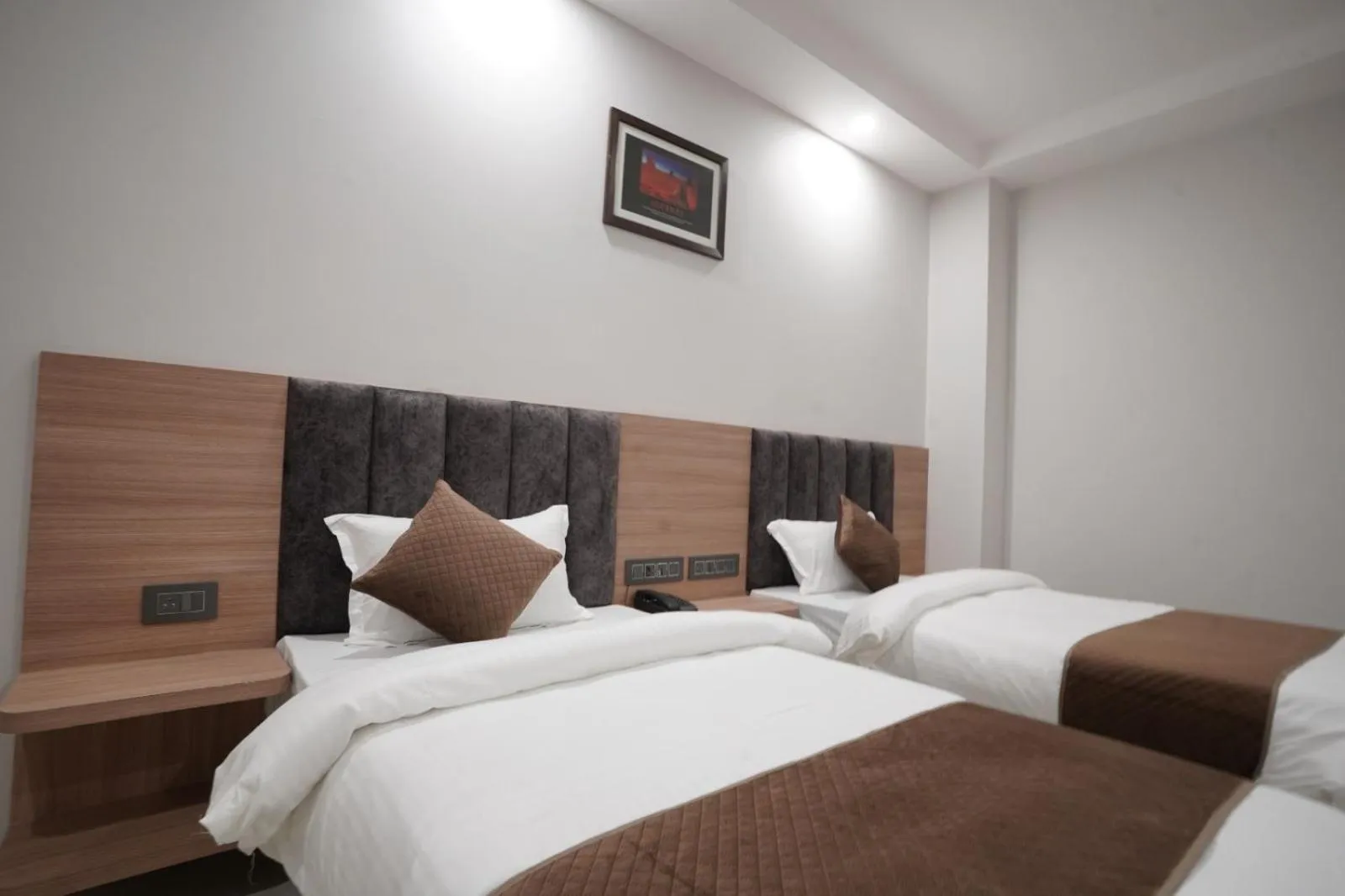 Bed in Hotel Krishna Inn