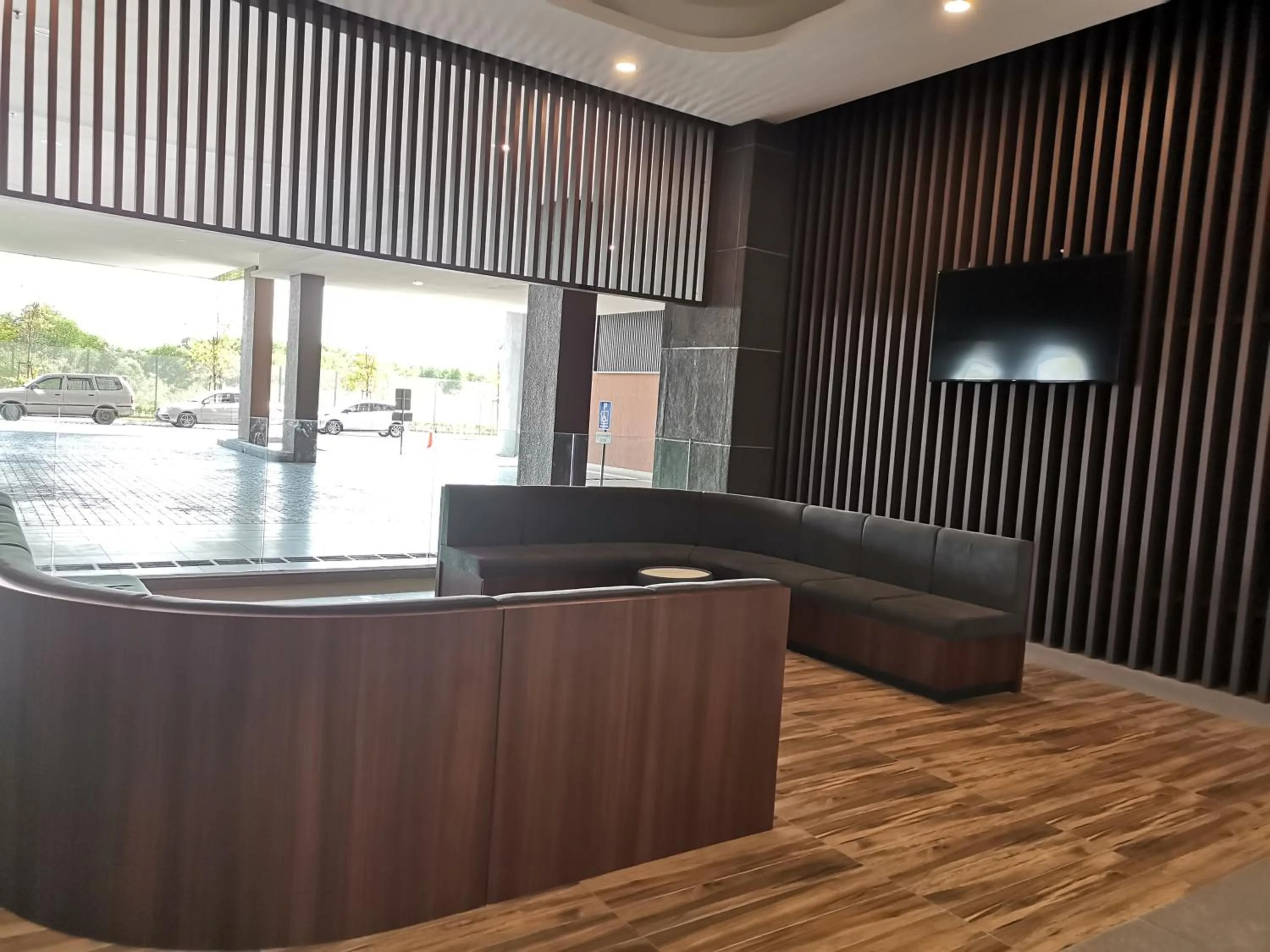 Seating area in Bali Residences Melaka by E&E Homestay