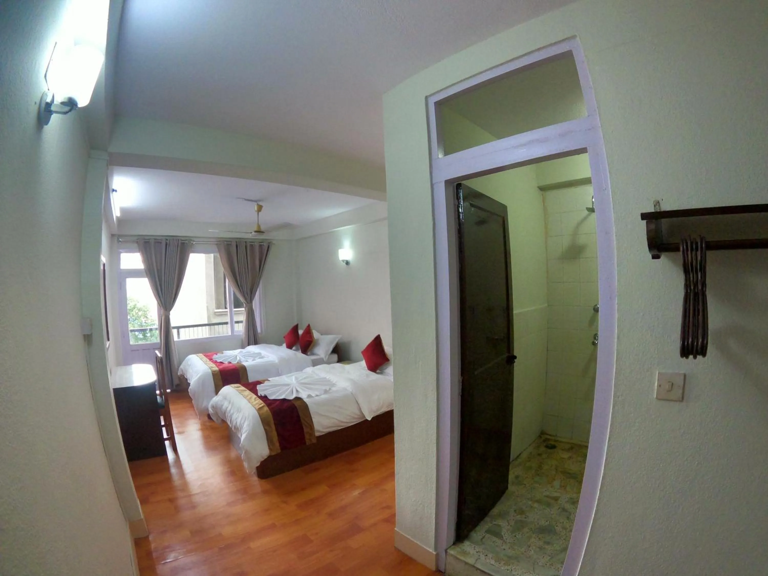 Photo of the whole room, Bed in Om Tara Guest House Pvt Ltd