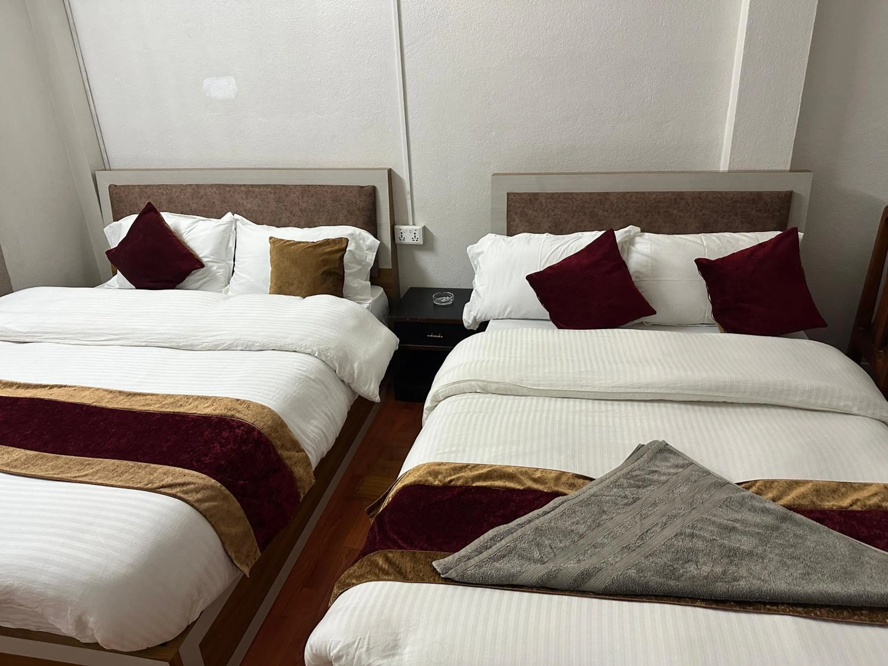 Bed in Om Tara Guest House Pvt Ltd