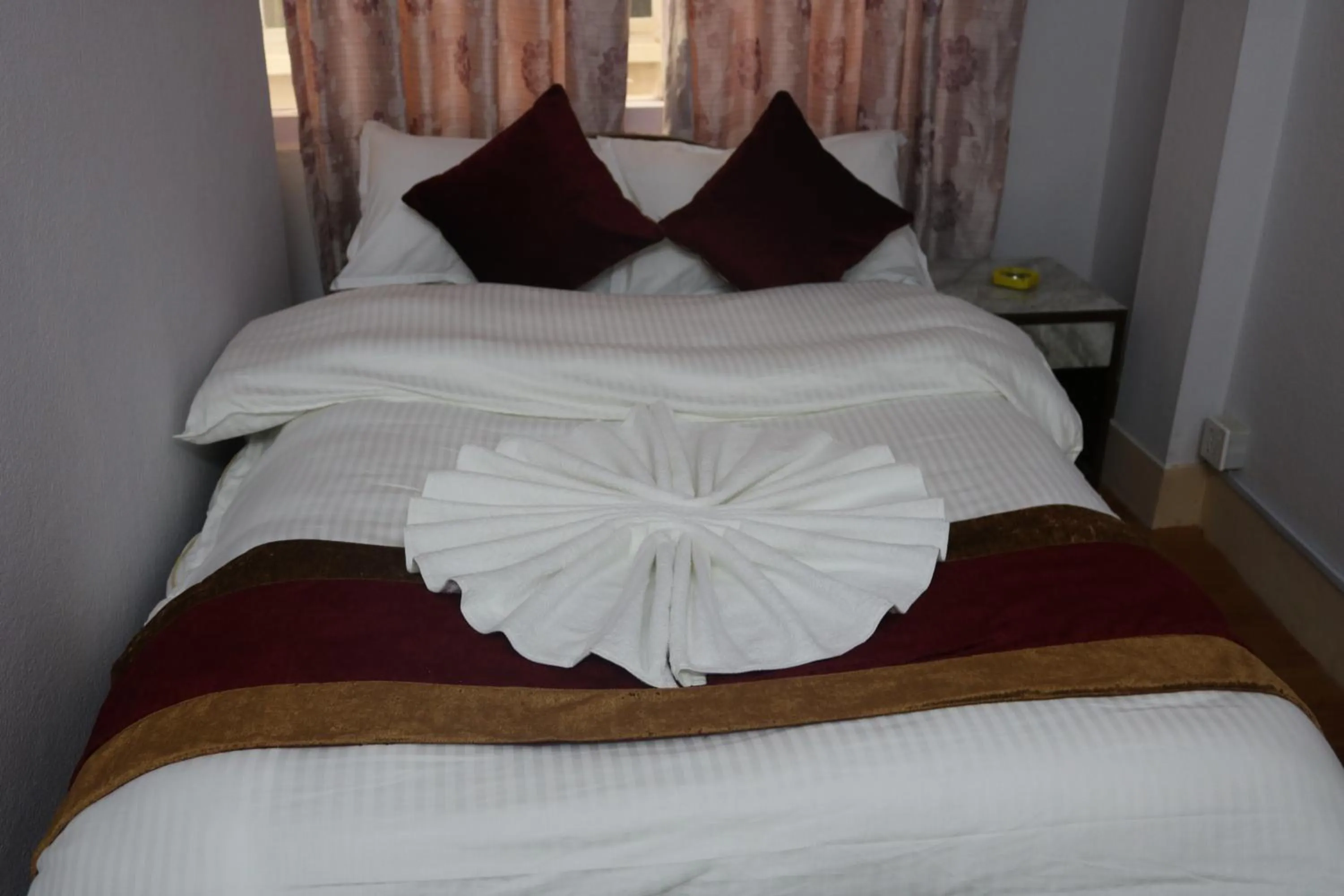Bed in Om Tara Guest House Pvt Ltd