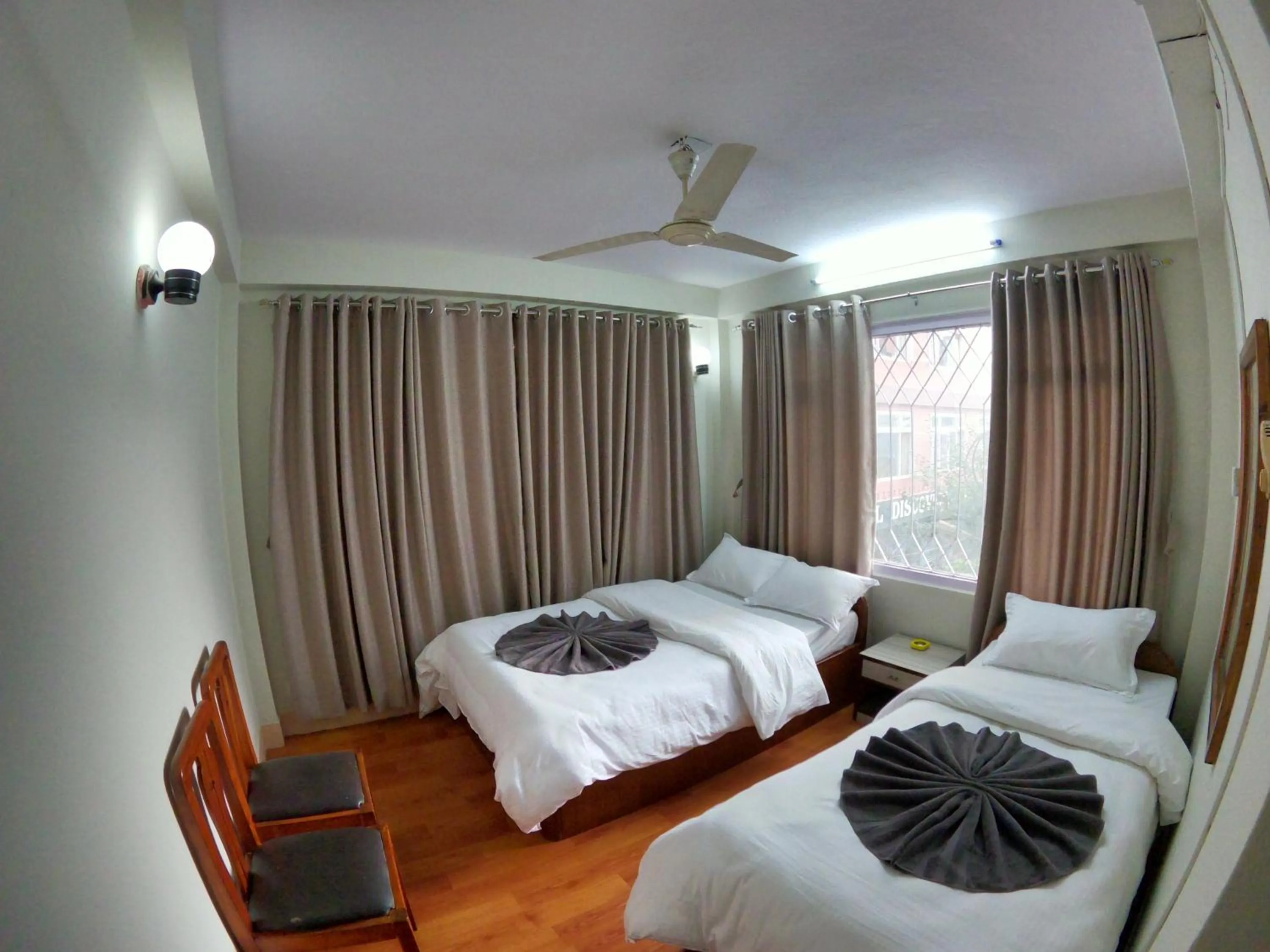 Bedroom, Bed in Om Tara Guest House Pvt Ltd