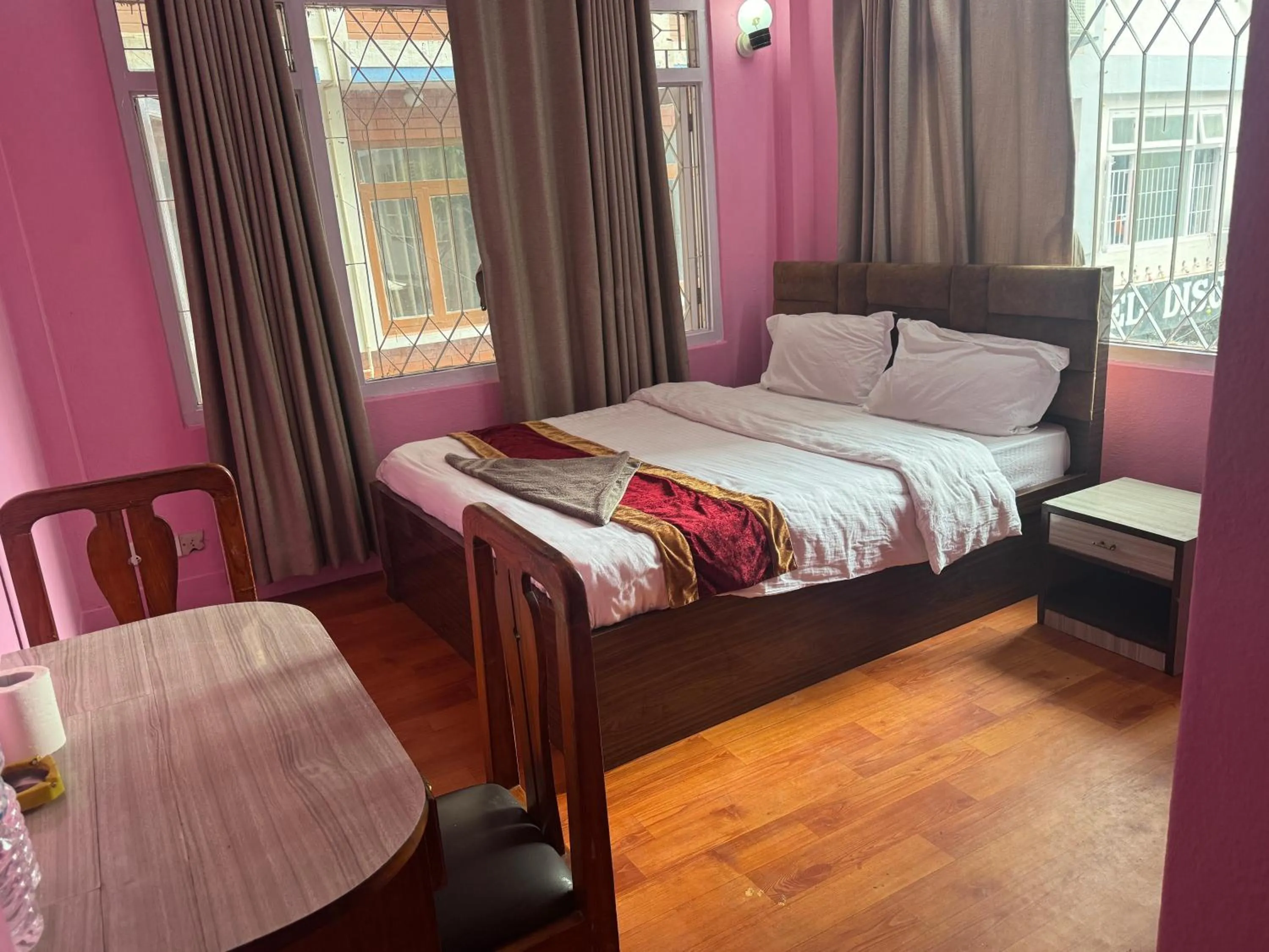 Bed in Om Tara Guest House Pvt Ltd