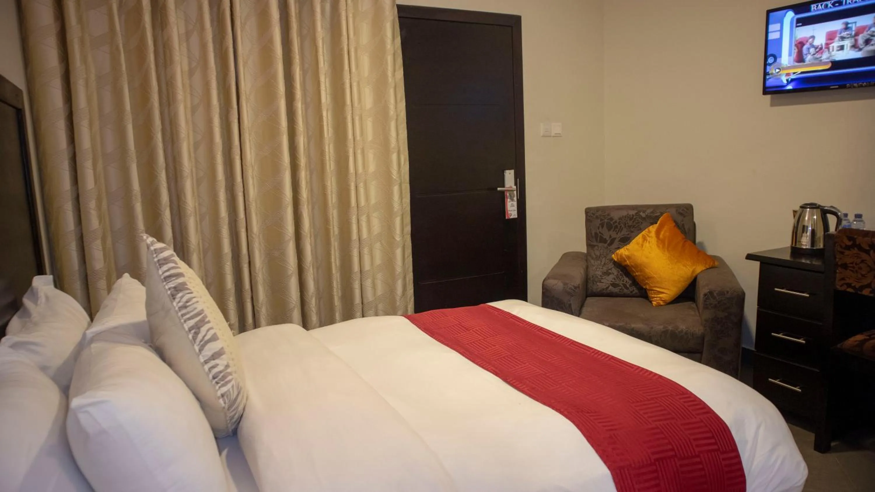 Bed in SSNIT GUEST HOUSE