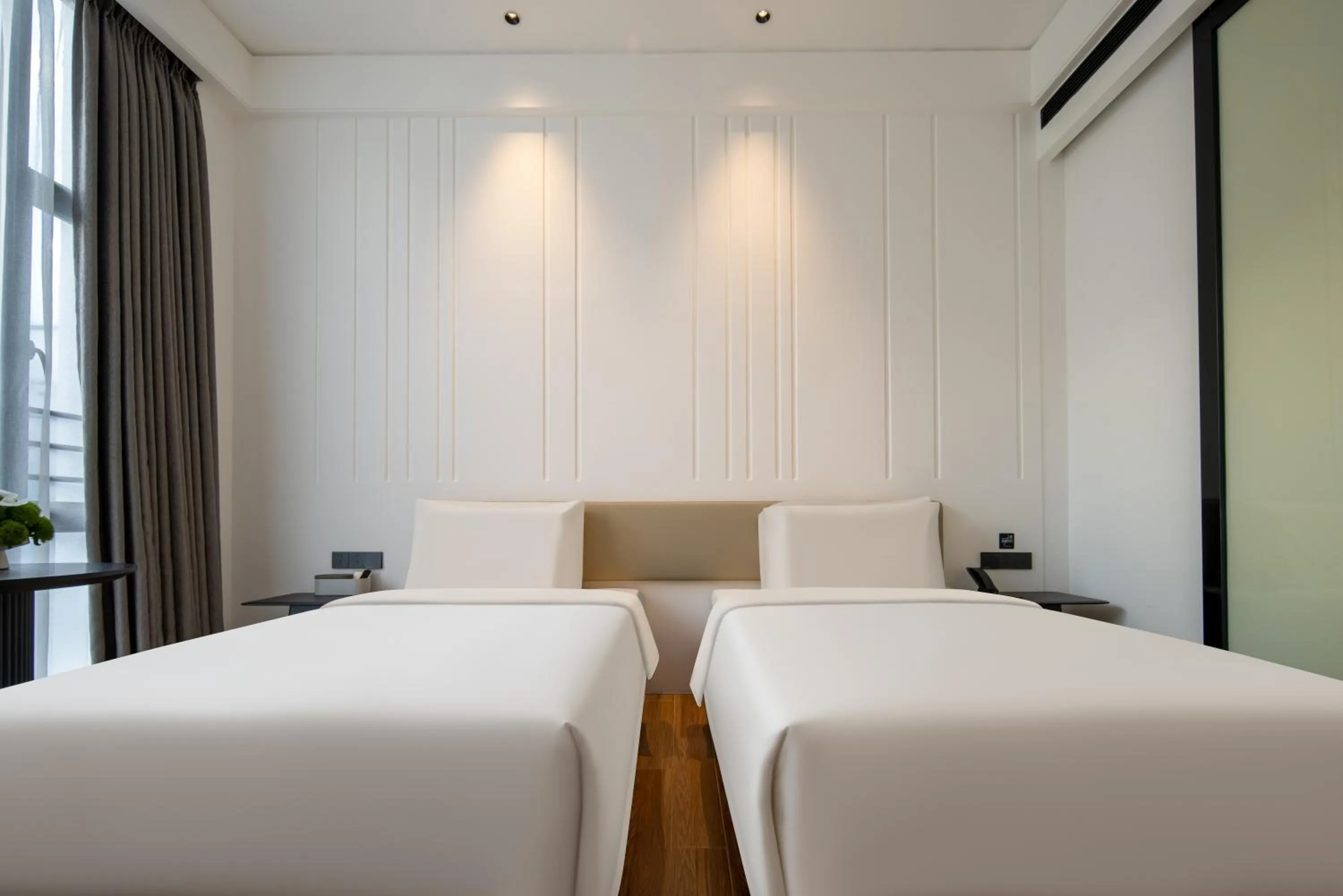 Bed in Atour X Hotel Shenzhen Dapeng Jiaochangwei