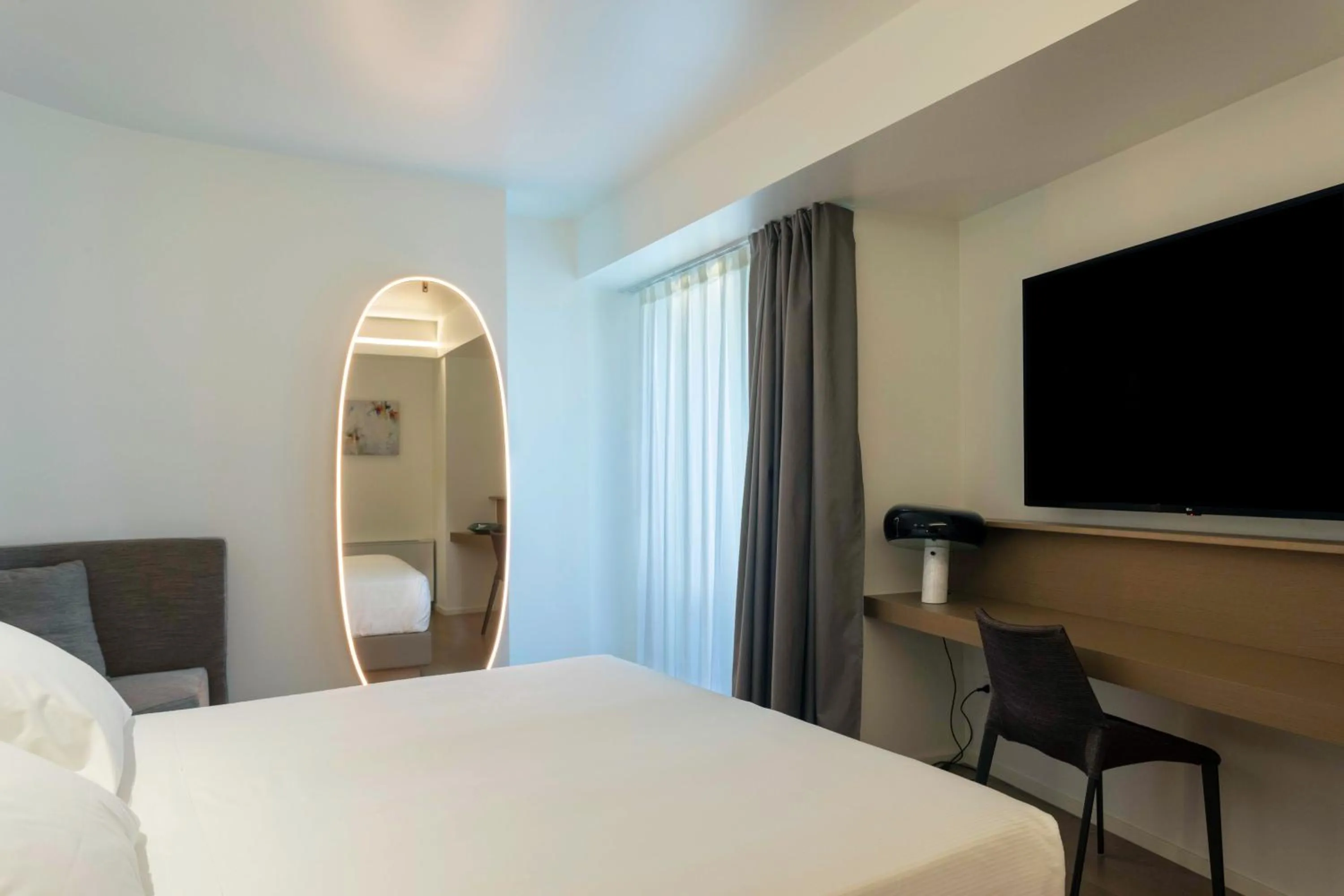 Photo of the whole room, Bed in Palazzo Sangiorgio