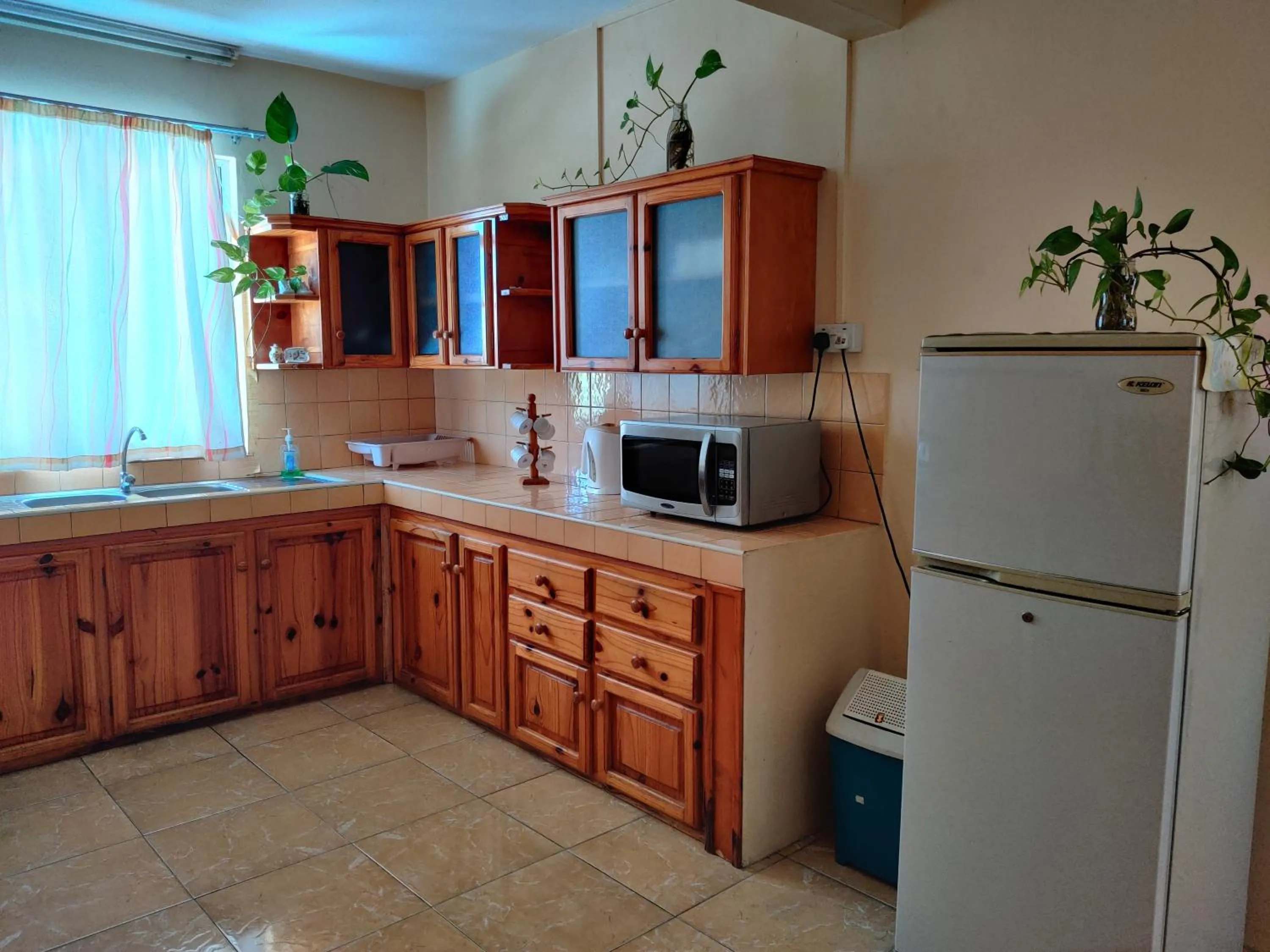 Kitchen or kitchenette in Bob Apartments