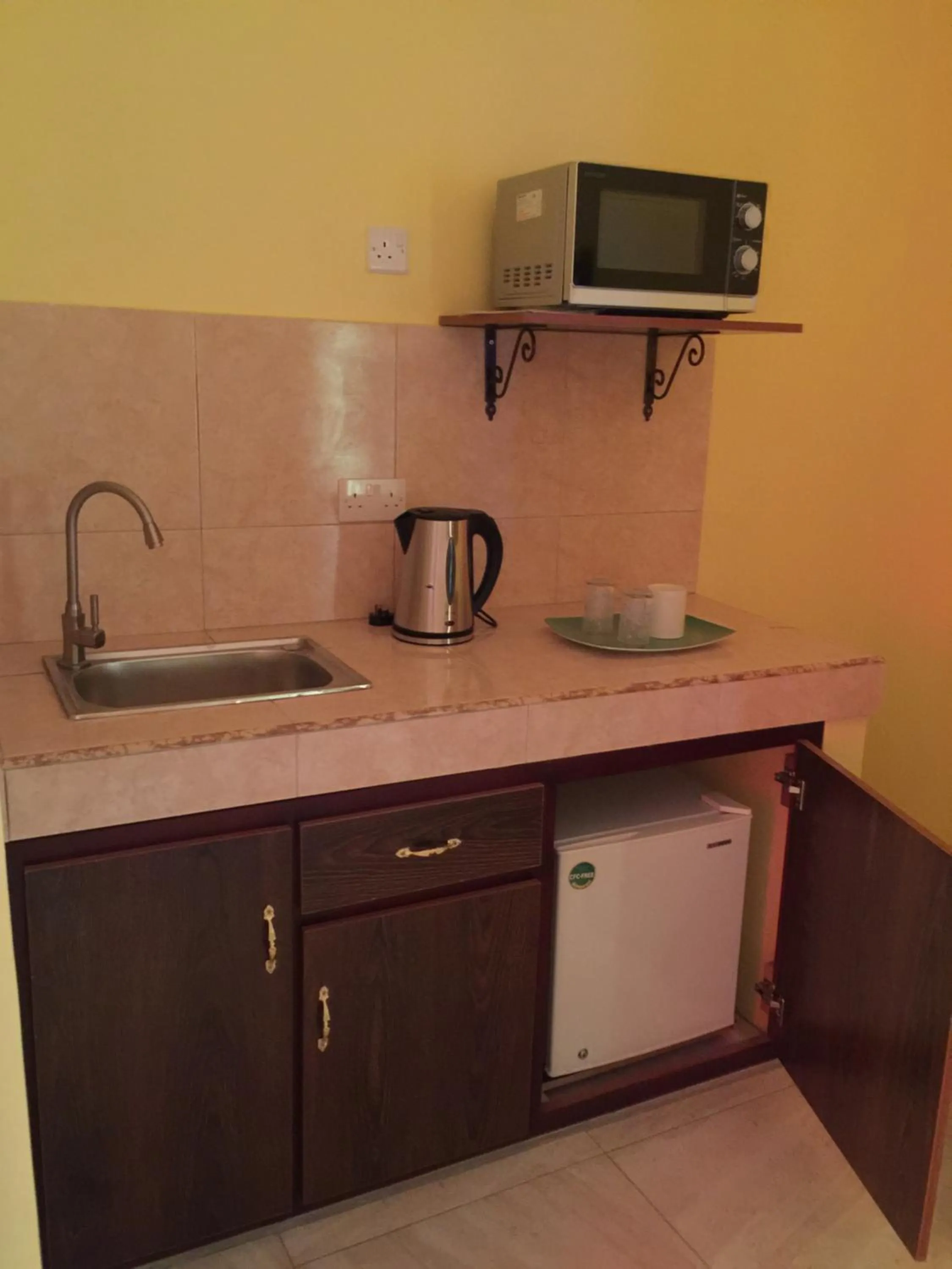 Kitchen or kitchenette in Bob Apartments