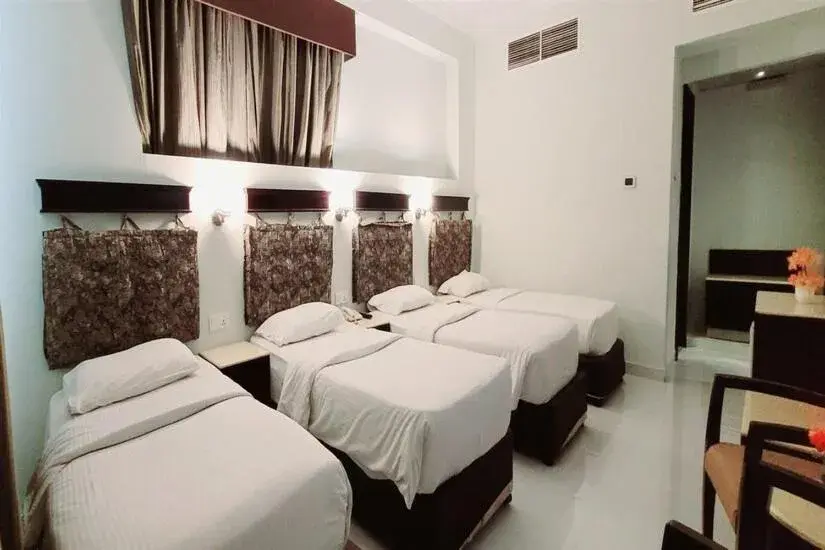 Deluxe Quadruple Room in Signature Inn Hotel Deira Deluxe Quadruple Room in Signature Inn Hotel Deira