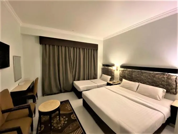 Bed in Signature Inn Hotel Deira