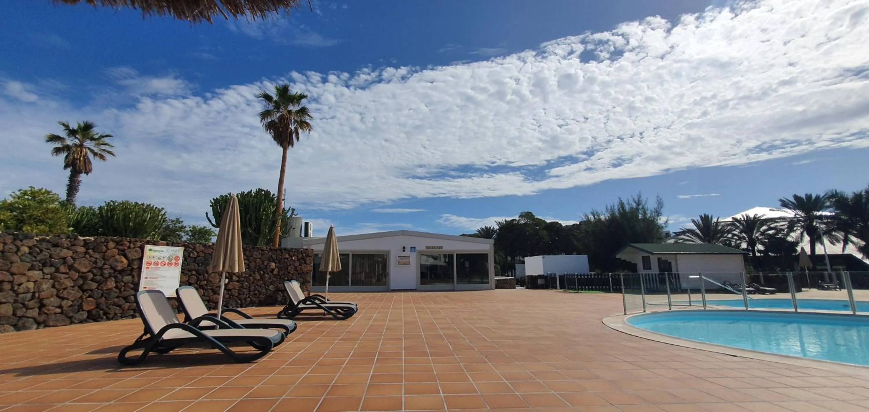 Lobby or reception in Palmeras Garden