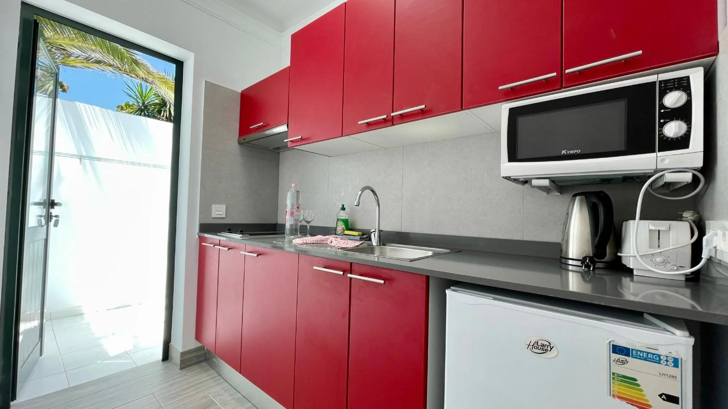 Kitchen or kitchenette in Palmeras Garden