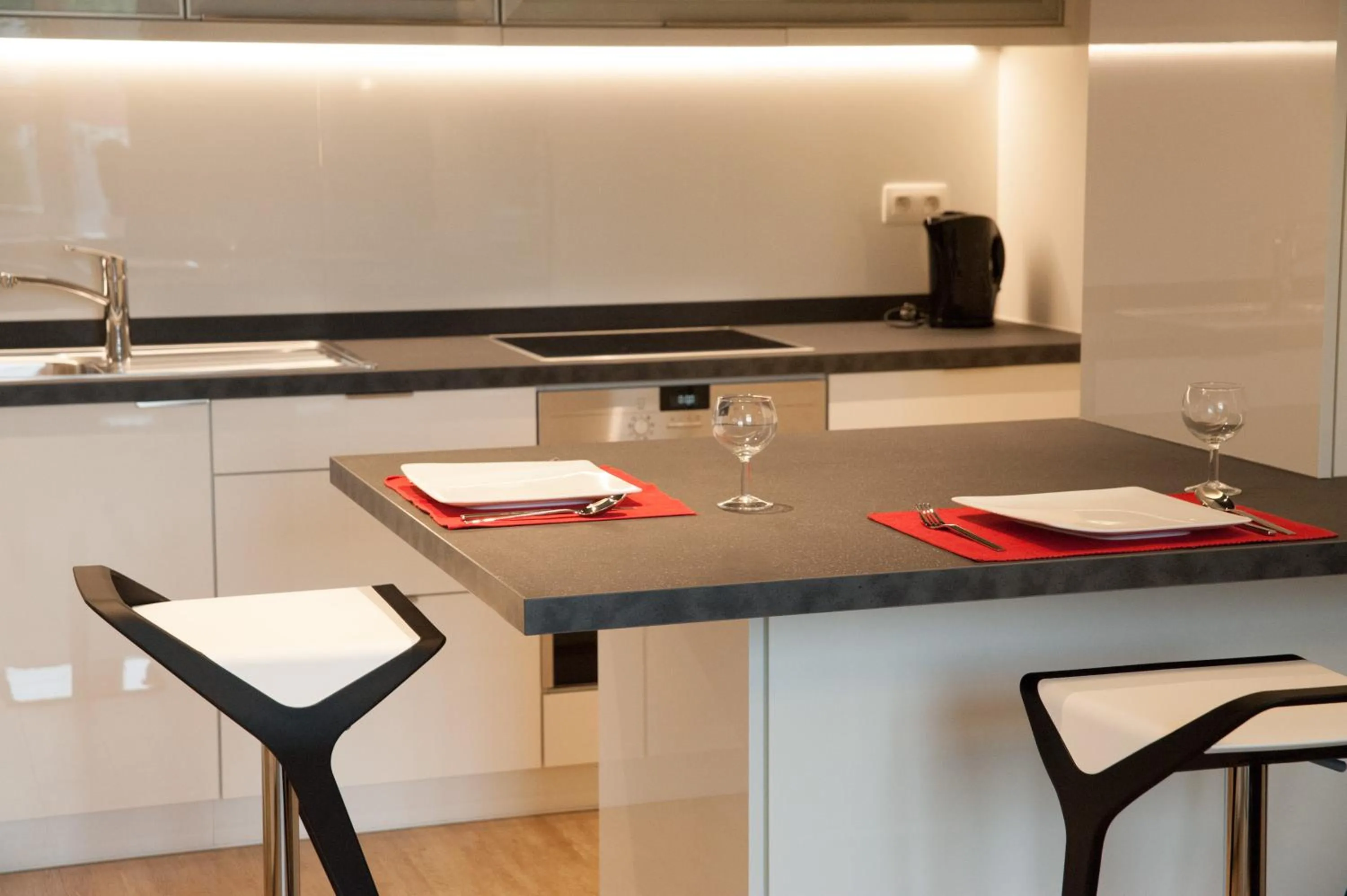 Kitchen or kitchenette in Appart'hotel Urban Lodge