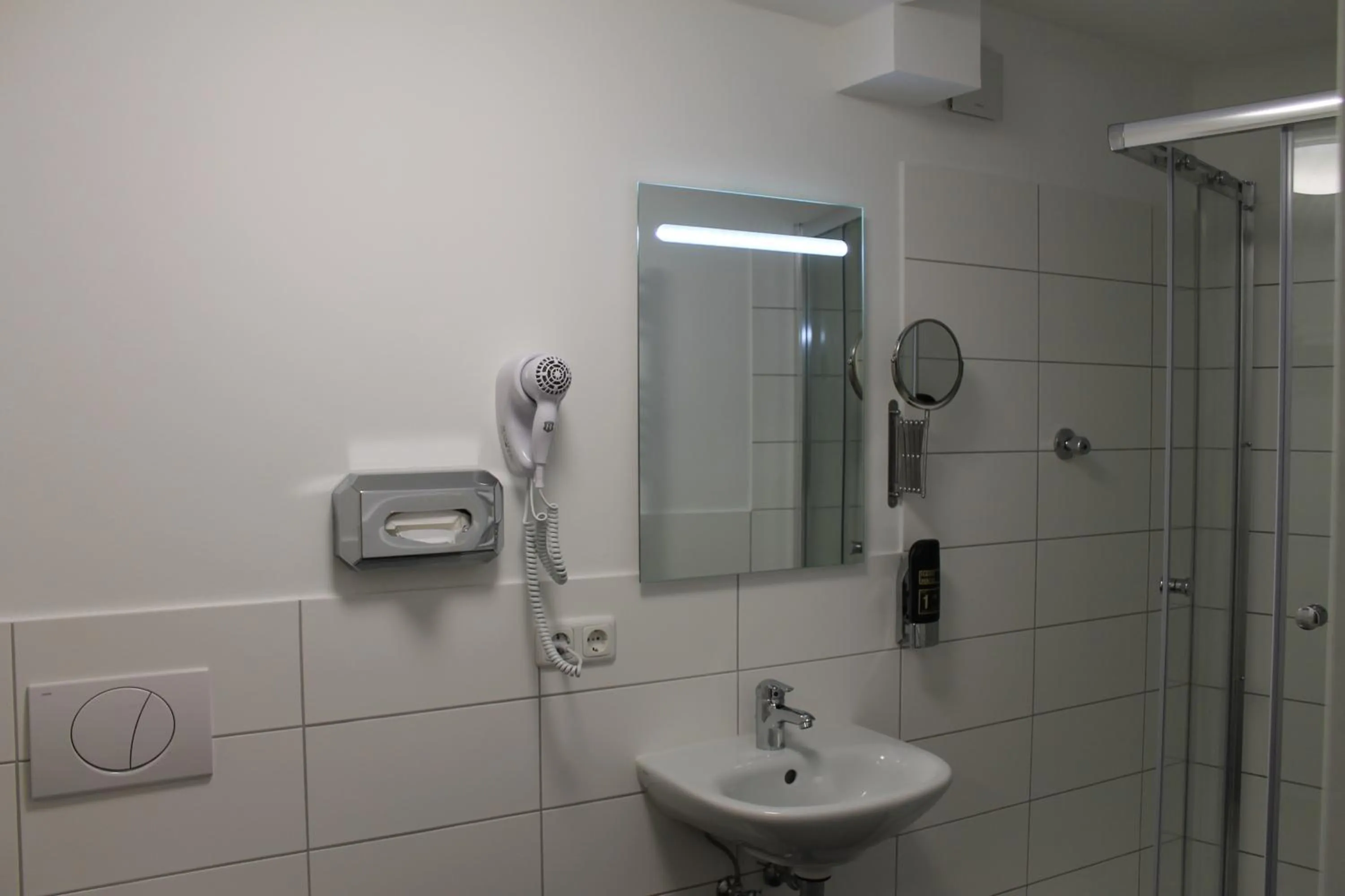 Bathroom in Apartment Hotel am Sand