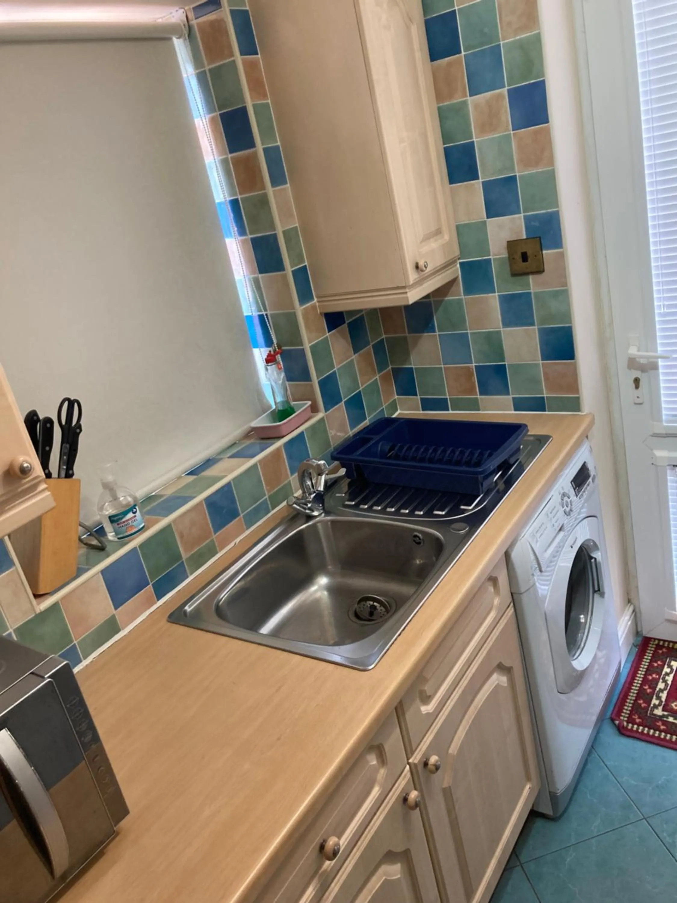 kitchen in Harman Suites Self-Catering Apartments Free WIFI & Parking