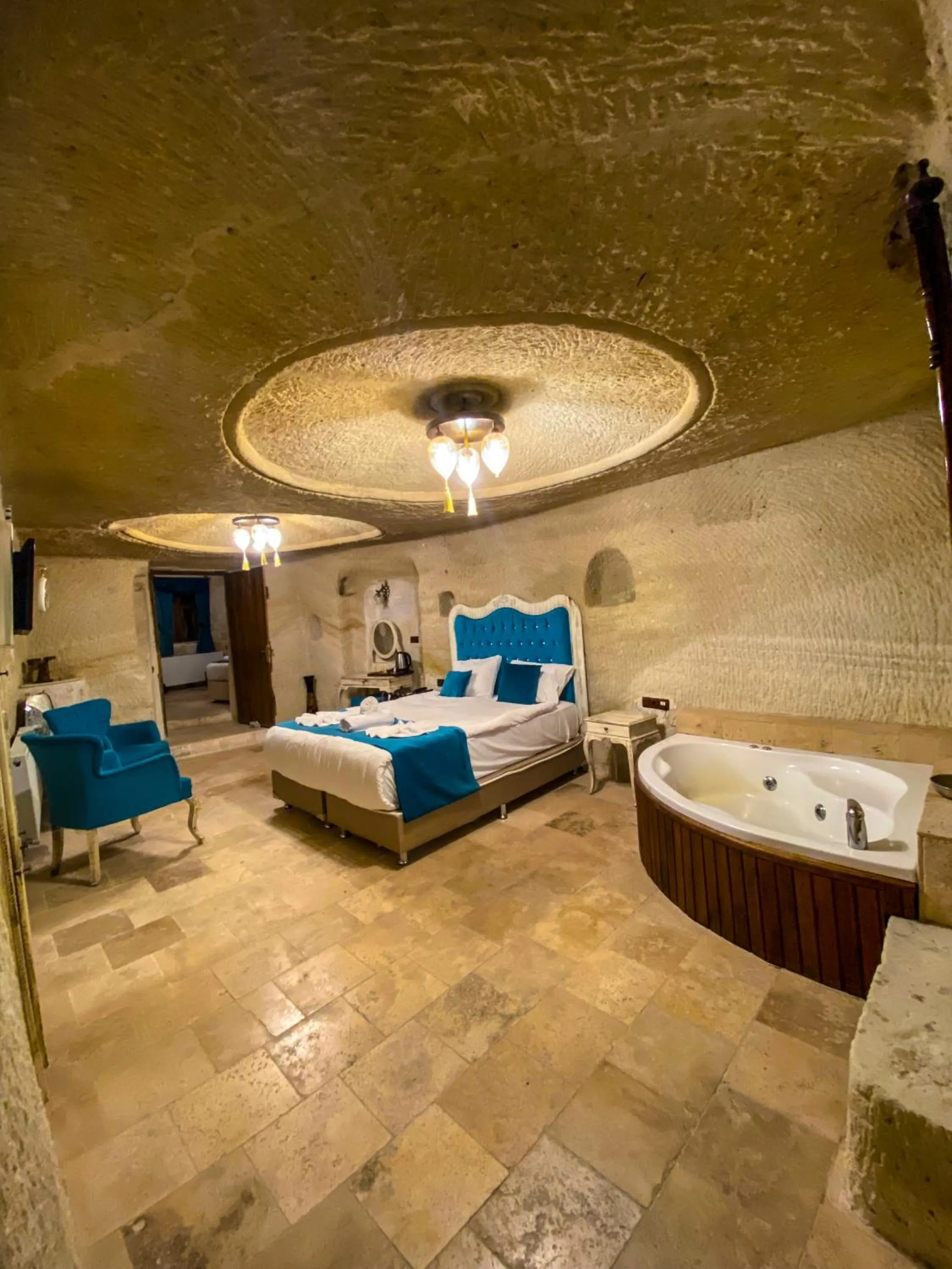 Bed in Milagre Cave Hotel