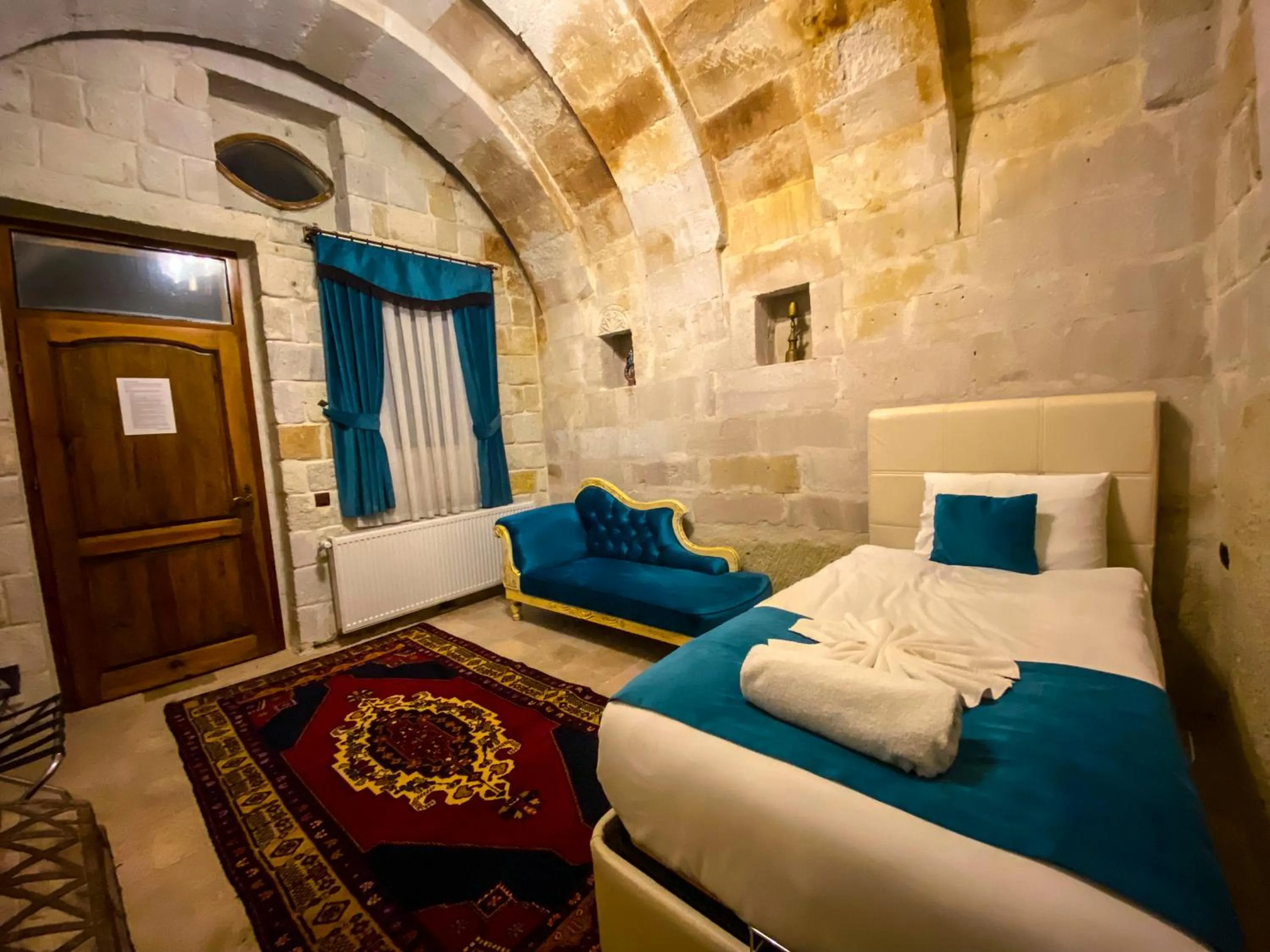 Bed in Milagre Cave Hotel