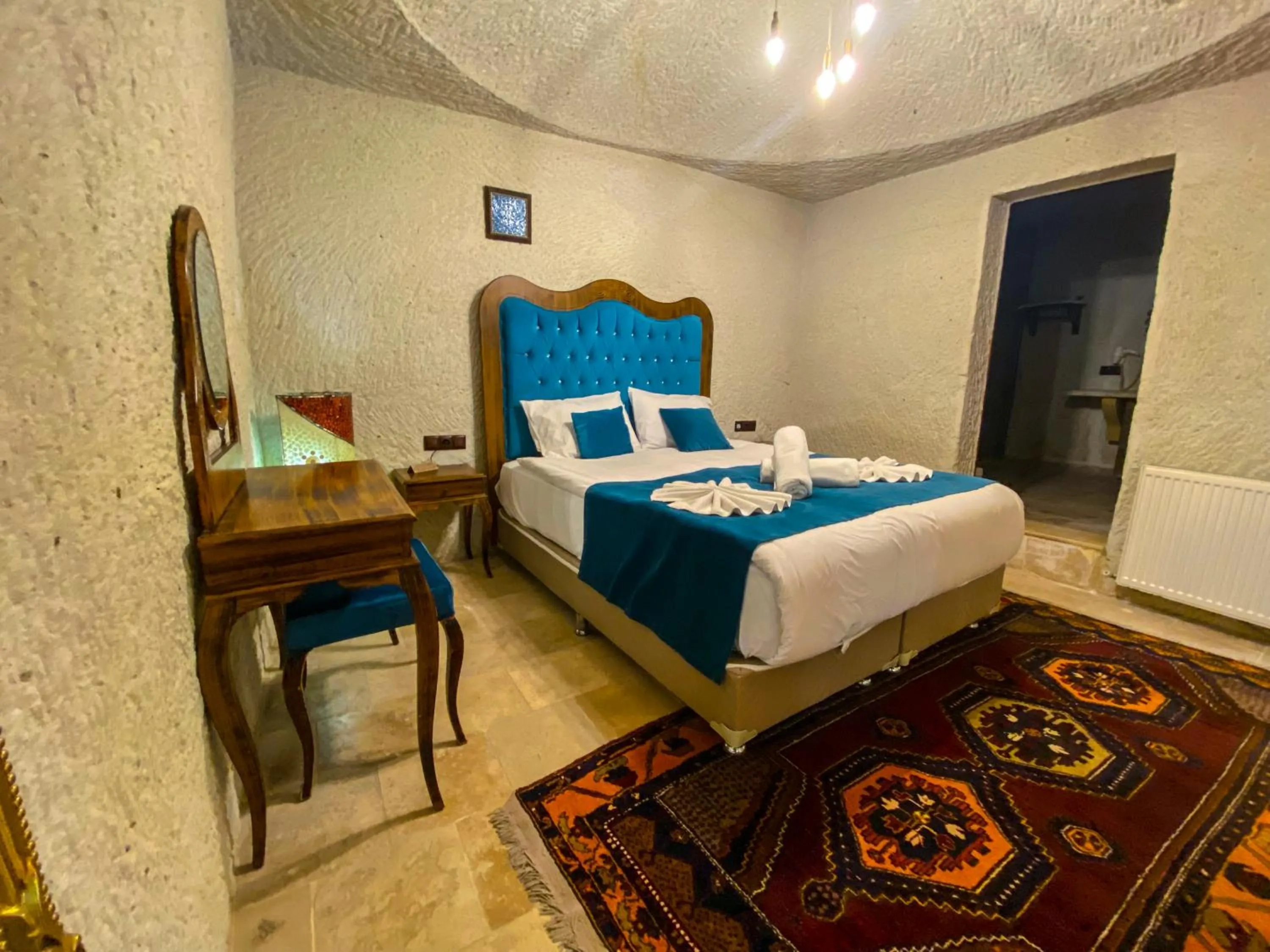 Bed in Milagre Cave Hotel