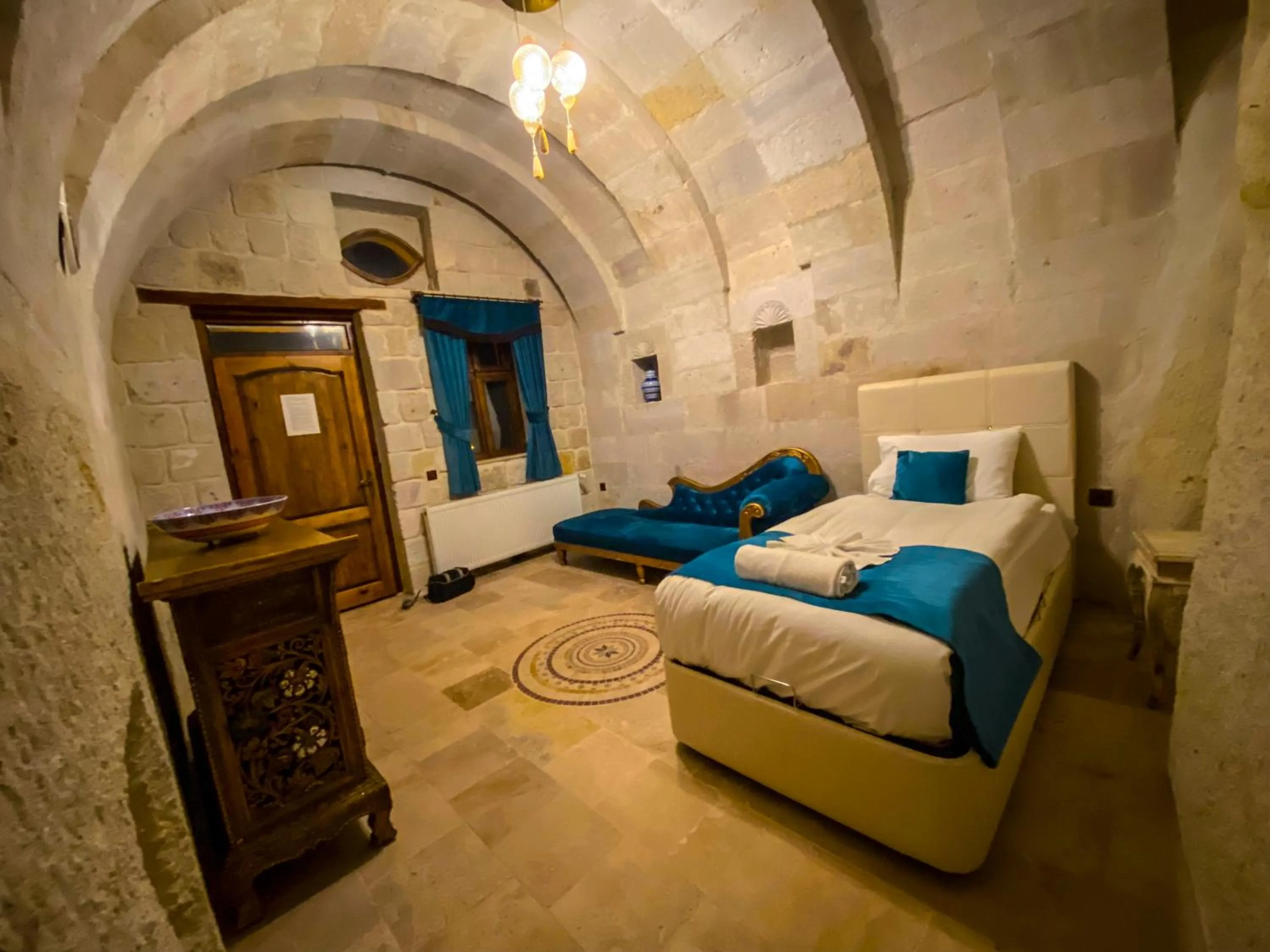 Bed in Milagre Cave Hotel