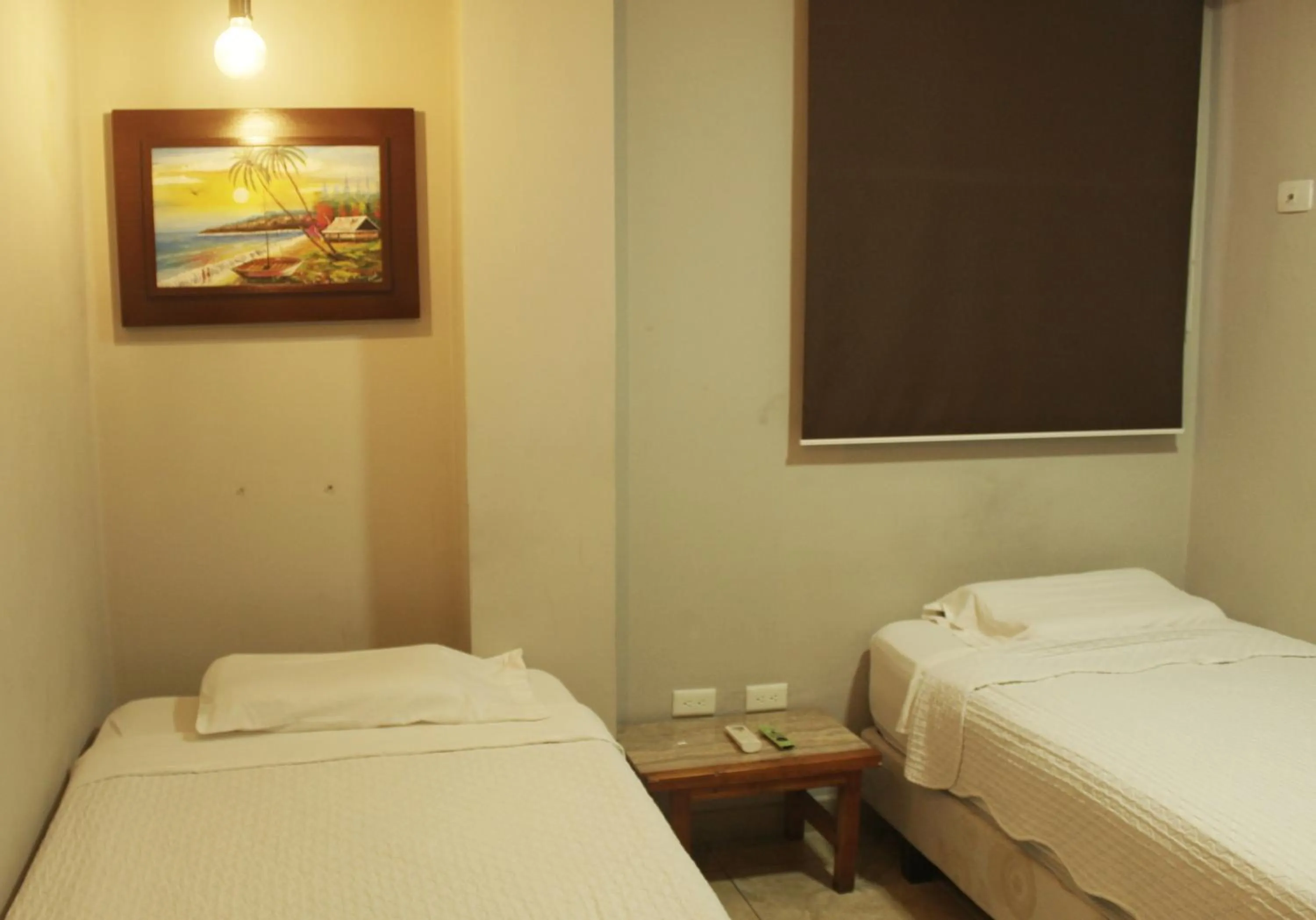 Bed in DC Suites Aeropuerto