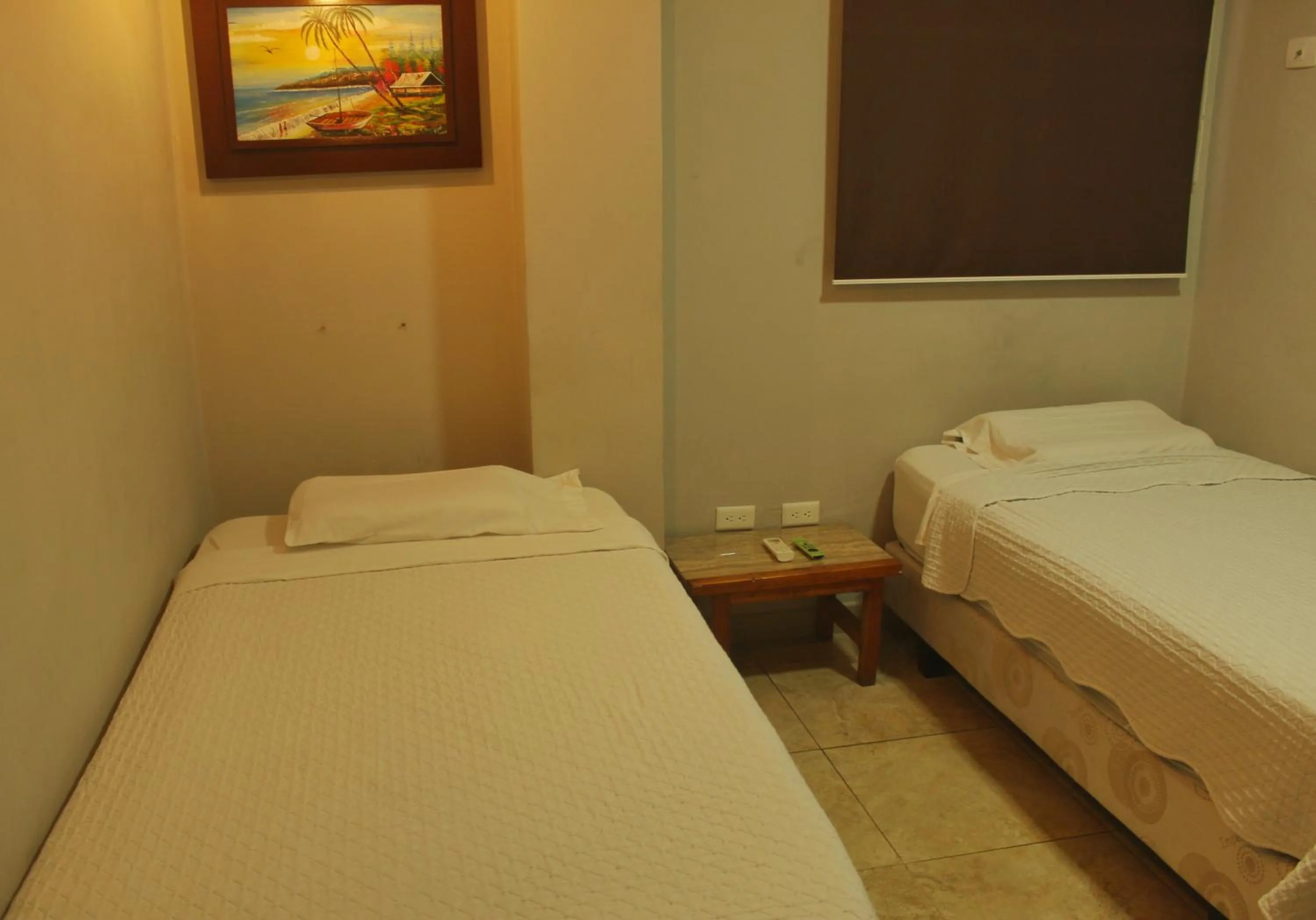 Bed in DC Suites Aeropuerto