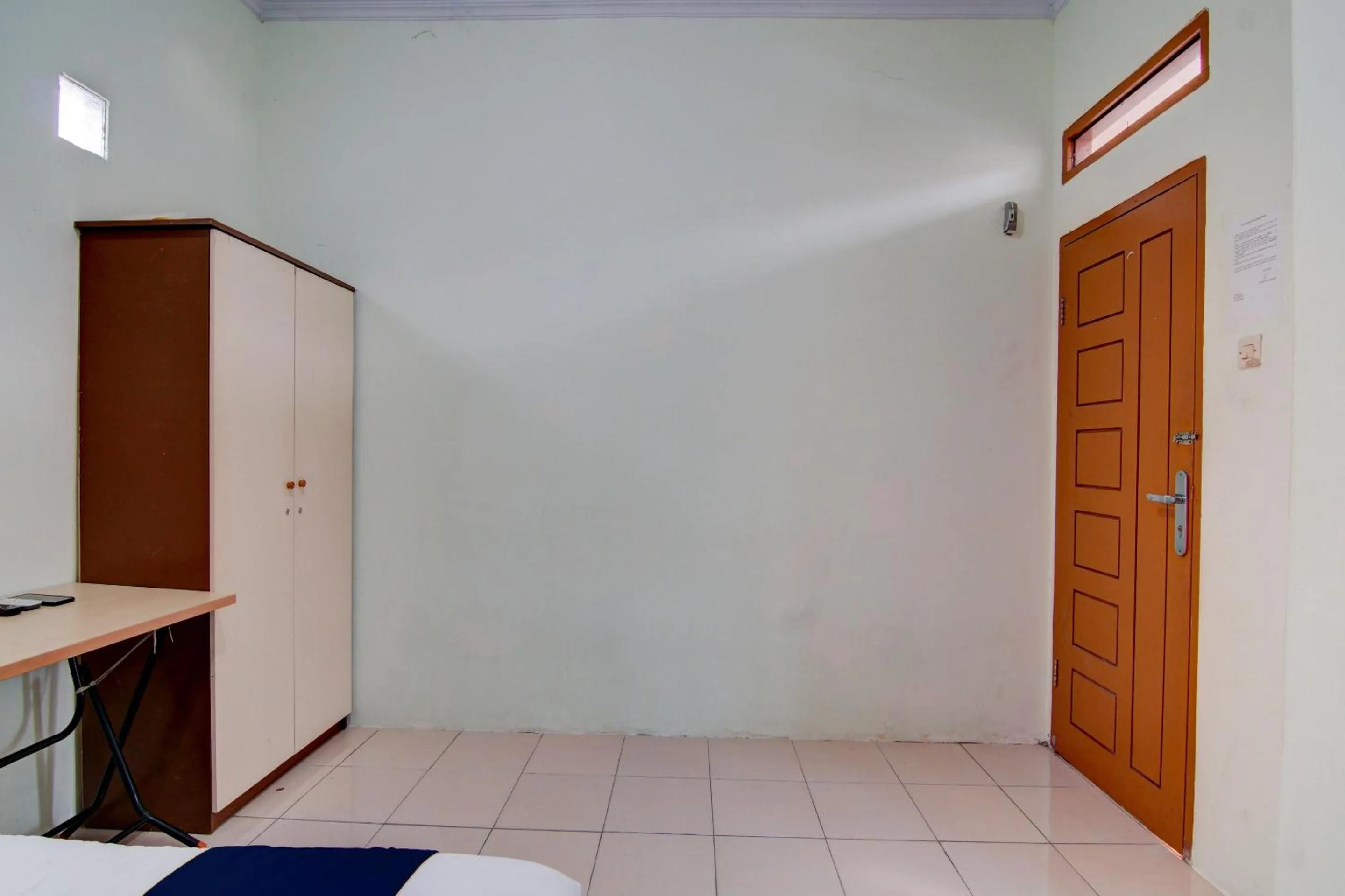 Bedroom in Hotel O Awi Stay Syariah Near SIMPANG KAWASAN INDUSTRI WILMAR PELINTUNG