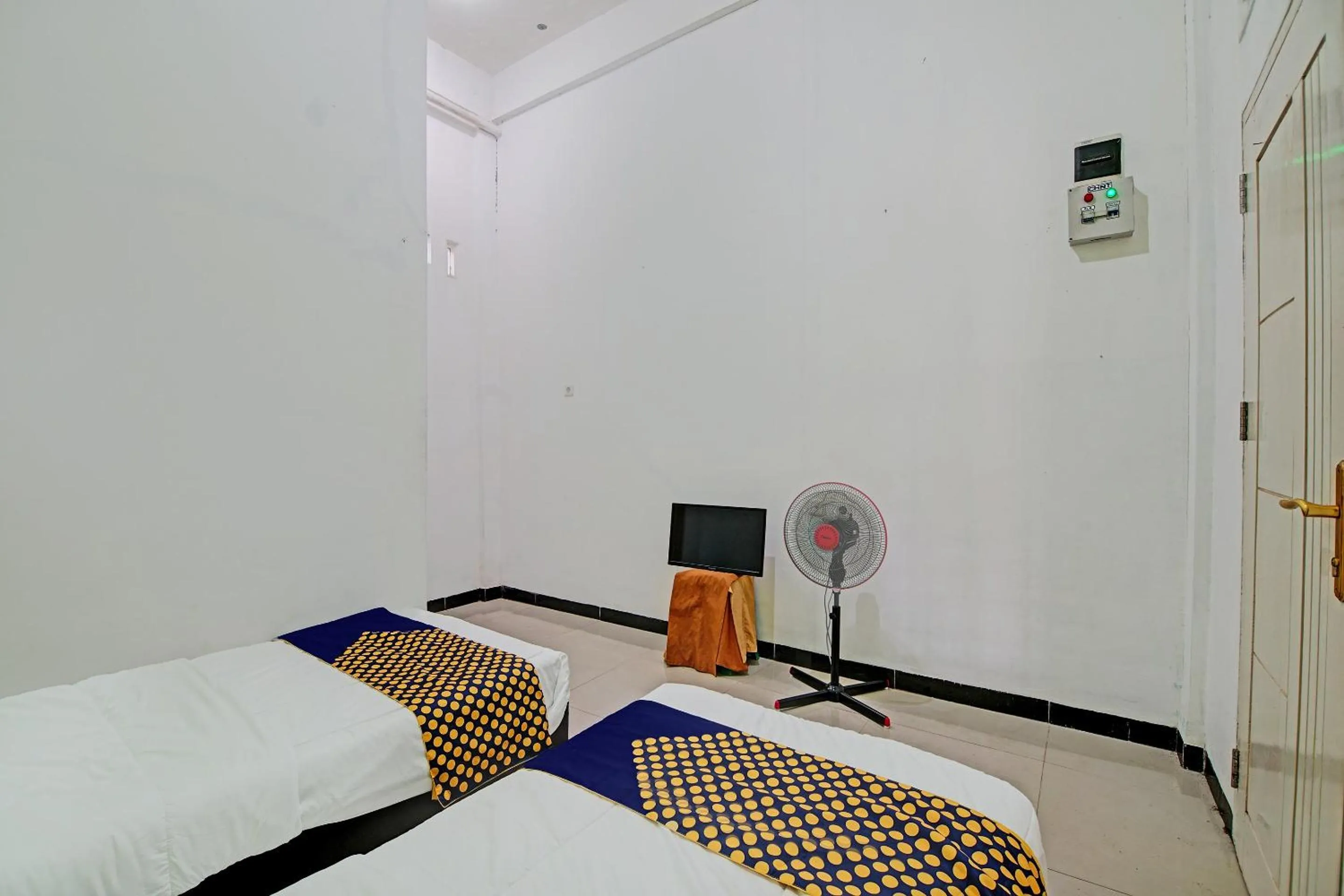 Bedroom, Bed in Hotel O Penginapan Puti SyariahNearBandara Sultan Syarif Kasim II
