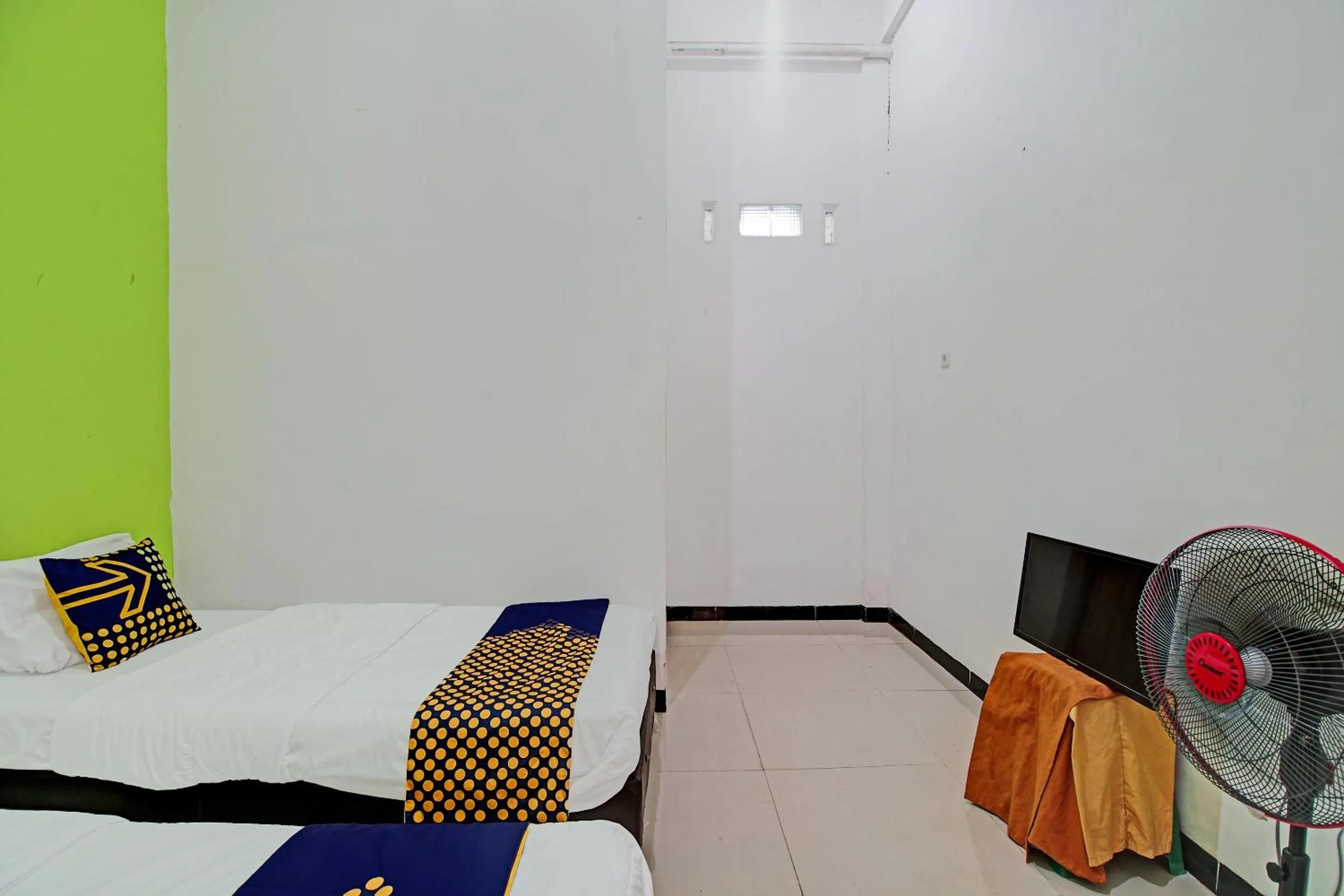 Bedroom, Bed in Hotel O Penginapan Puti SyariahNearBandara Sultan Syarif Kasim II
