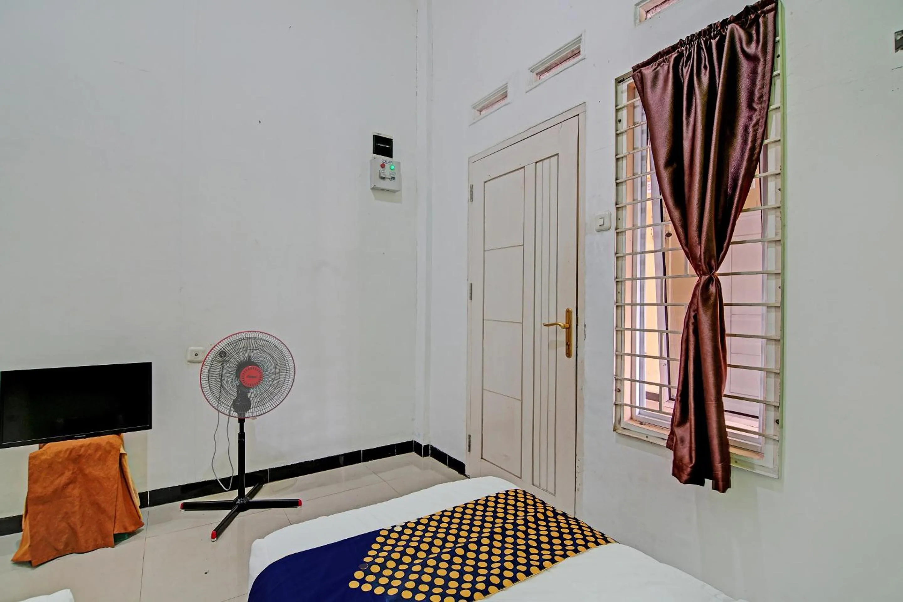 Bedroom, Bed in Hotel O Penginapan Puti SyariahNearBandara Sultan Syarif Kasim II