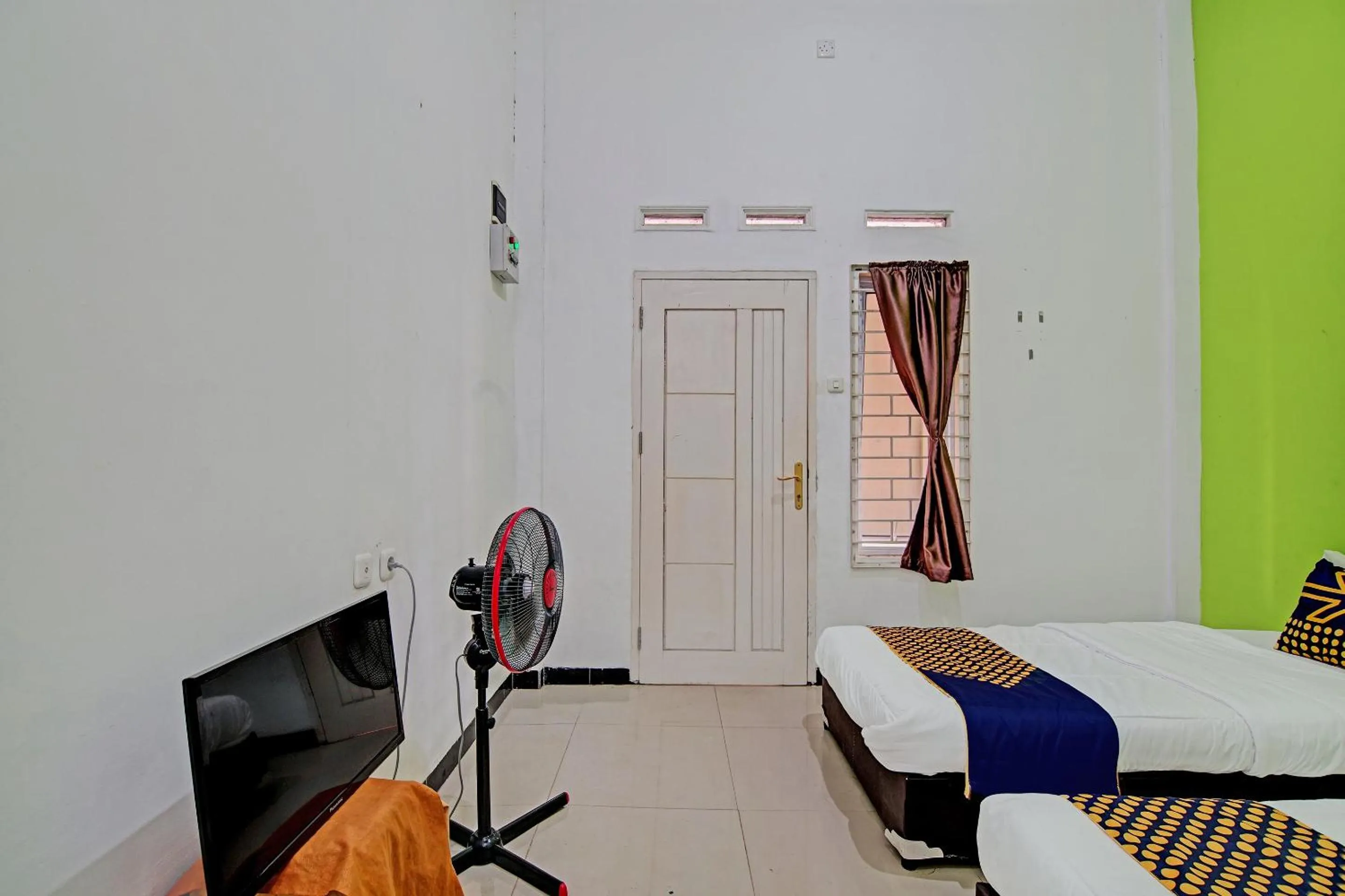 Bedroom, Bed in Hotel O Penginapan Puti SyariahNearBandara Sultan Syarif Kasim II