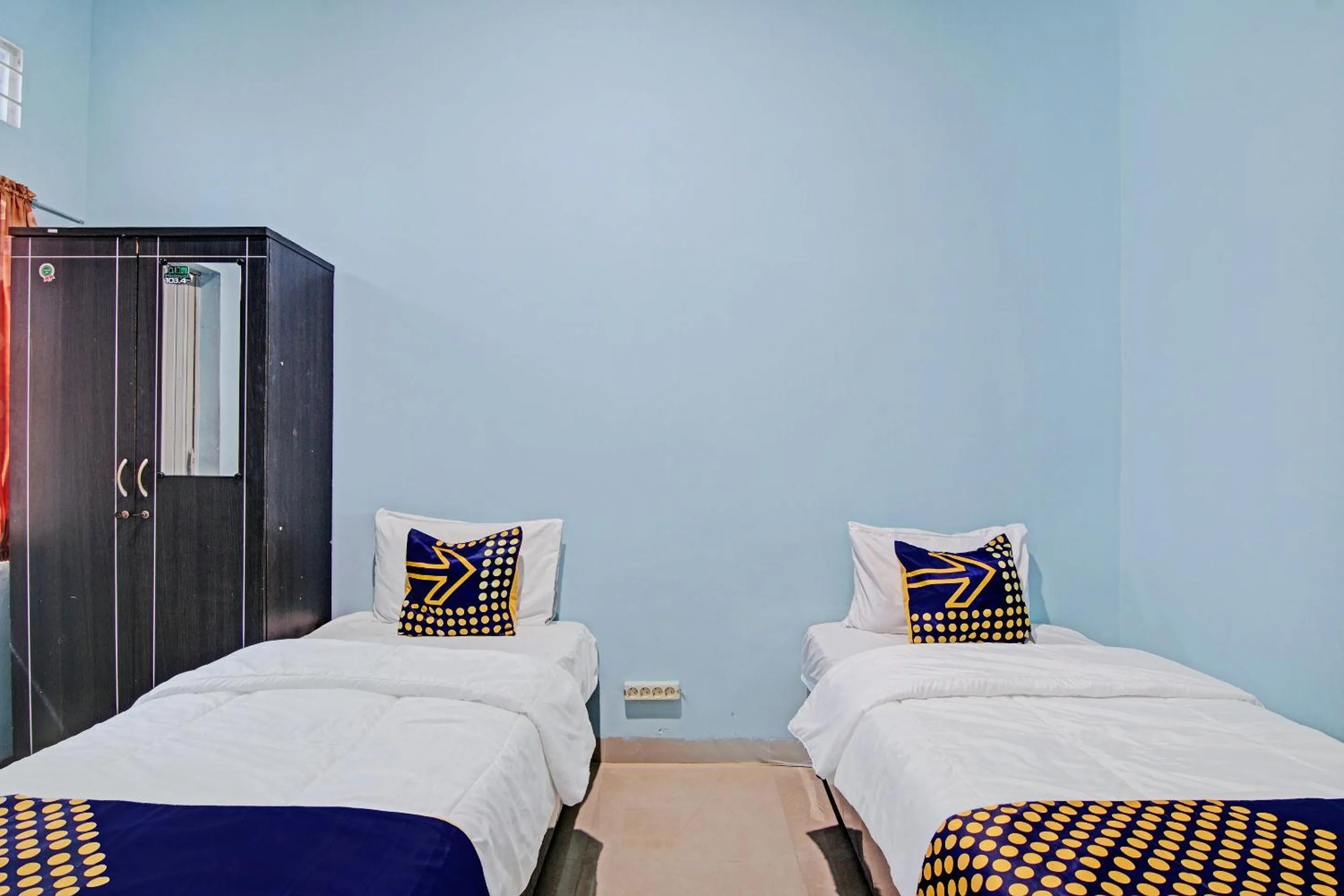 Bedroom, Bed in Hotel O Penginapan Puti SyariahNearBandara Sultan Syarif Kasim II