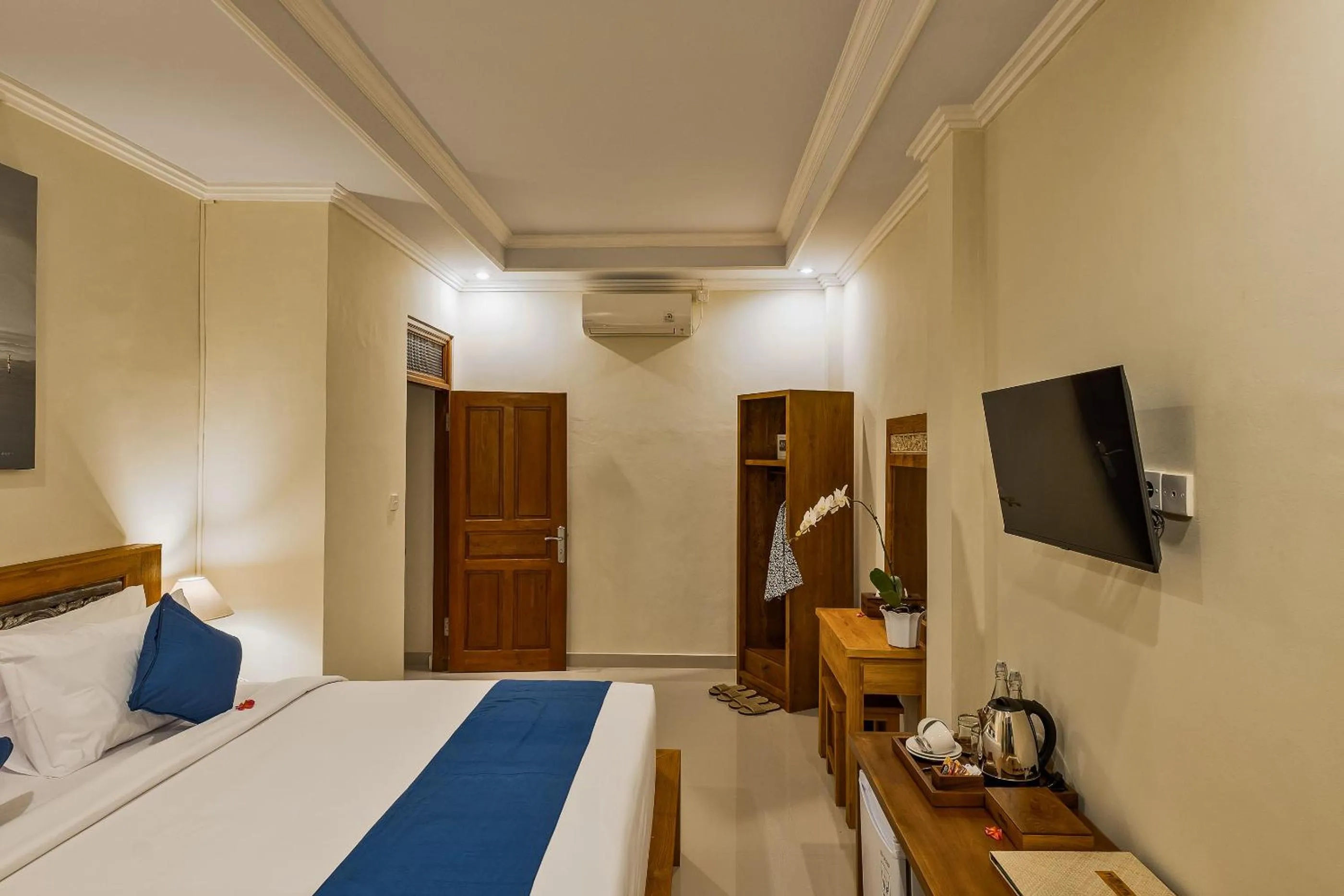 Bed in Tigata Ubud Cottage