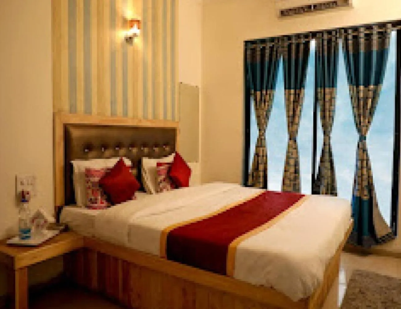 Bedroom in Orange Inn Hotel