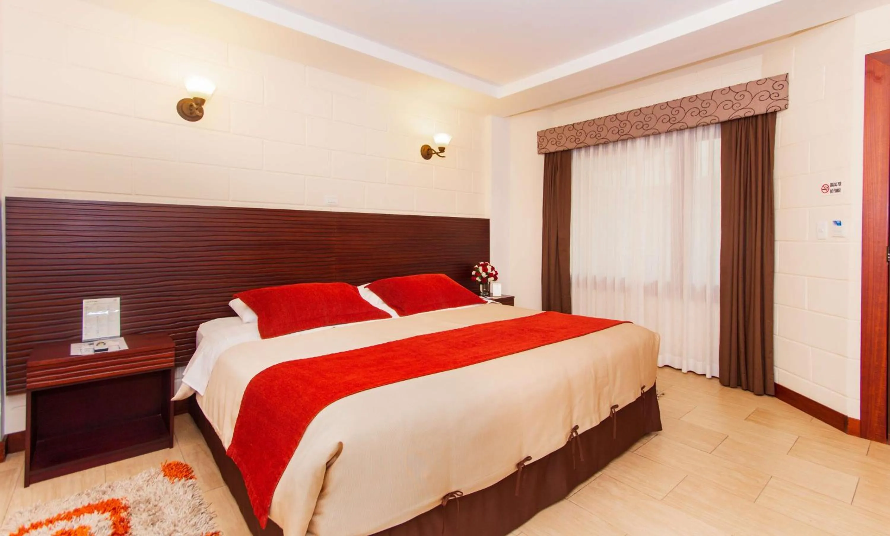 Photo of the whole room, Bed in Hotel Rincon de Puembo; BW Signature Collection