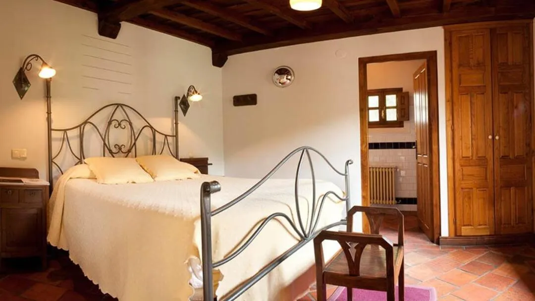 Bed in HOTEL RURAL ARREDONDO