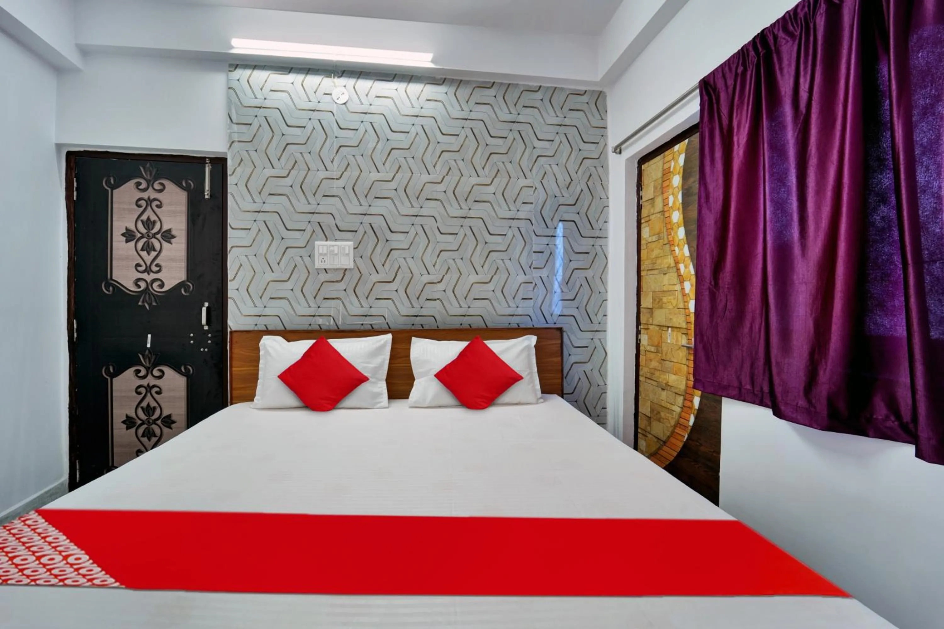 Bedroom in Super Hotel O Mahal Inn