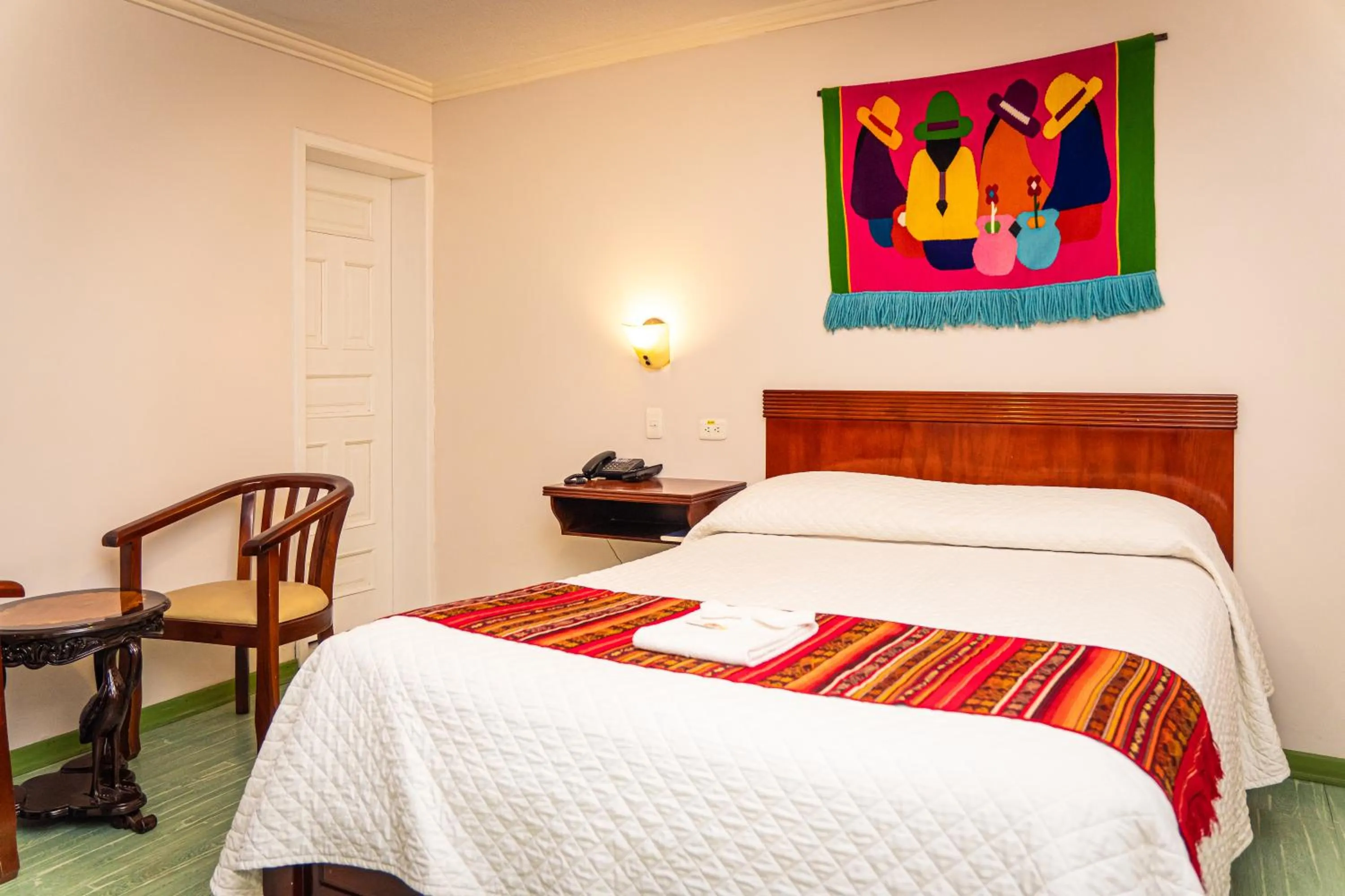 Bed in Hotel El Indio Inn