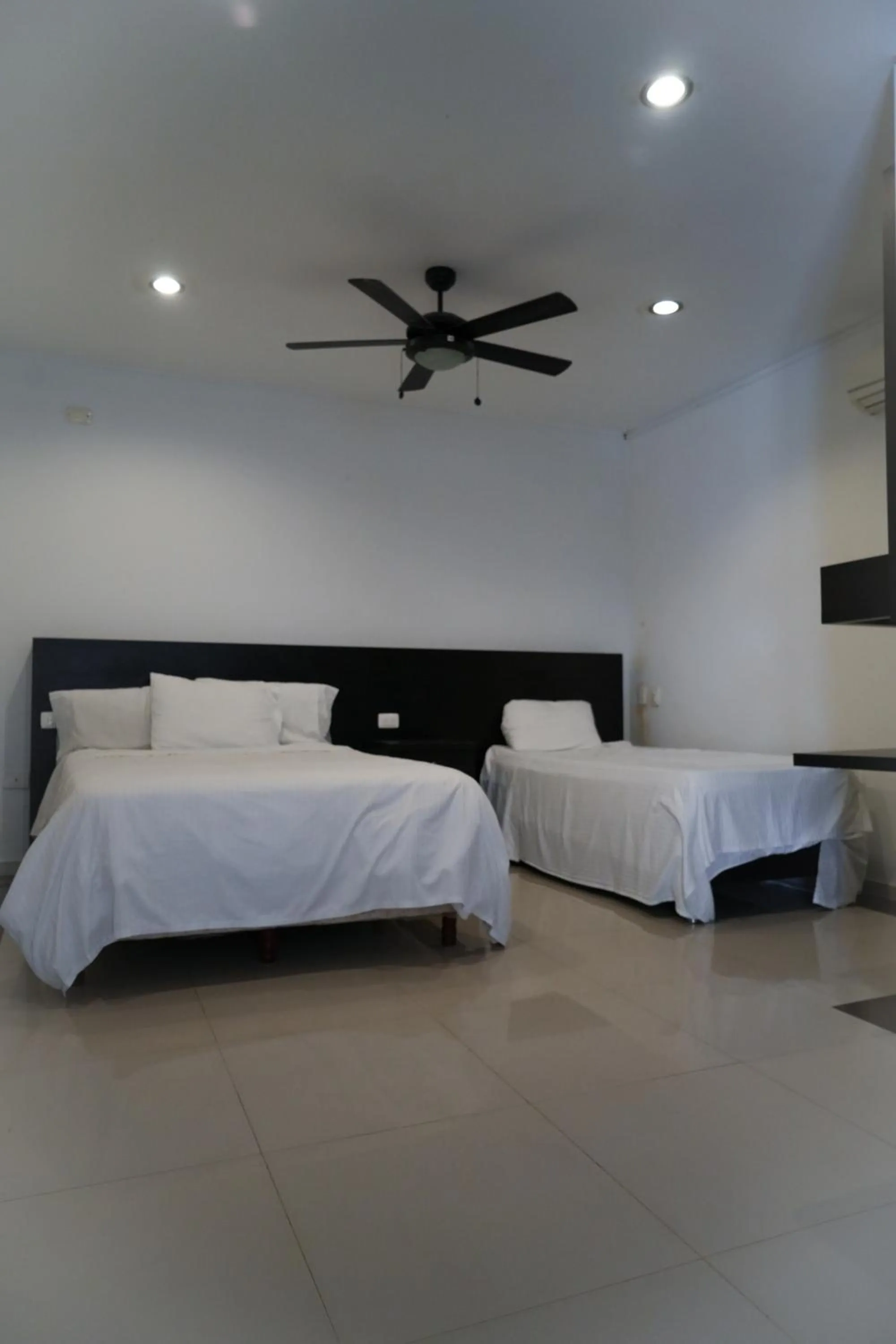 Bed in Serenity Suites Casa Boutique