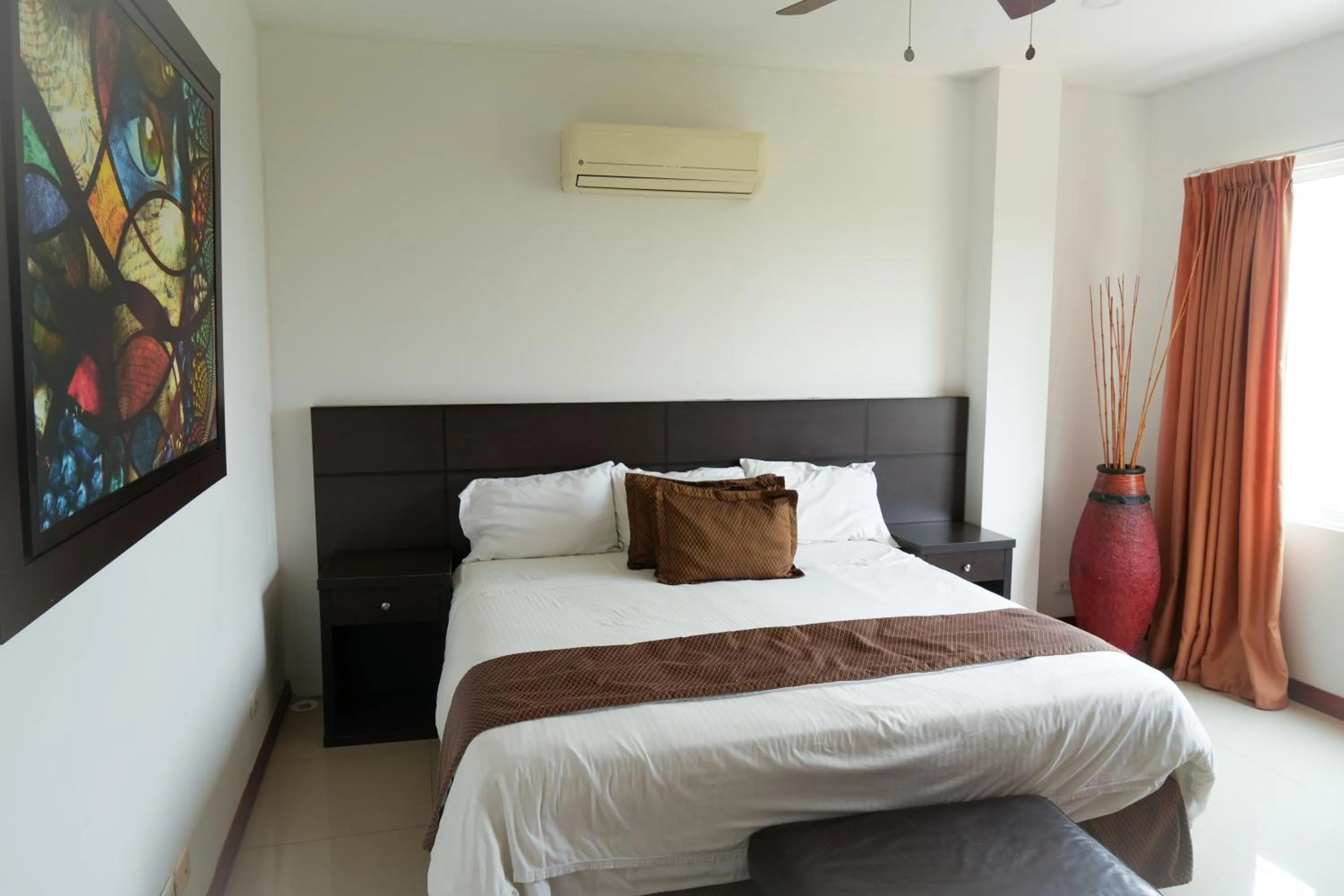 air conditioner, Bed in Serenity Suites Casa Boutique