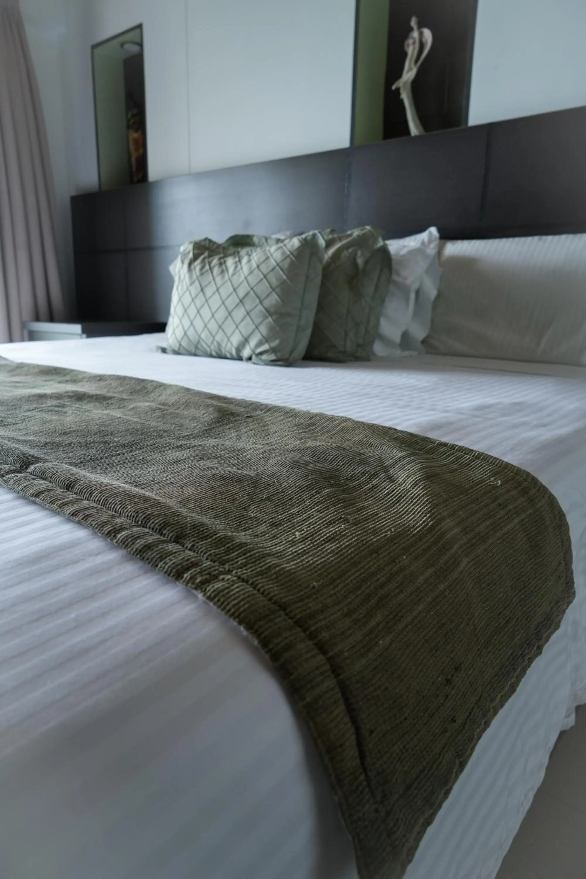 Bed in Serenity Suites Casa Boutique