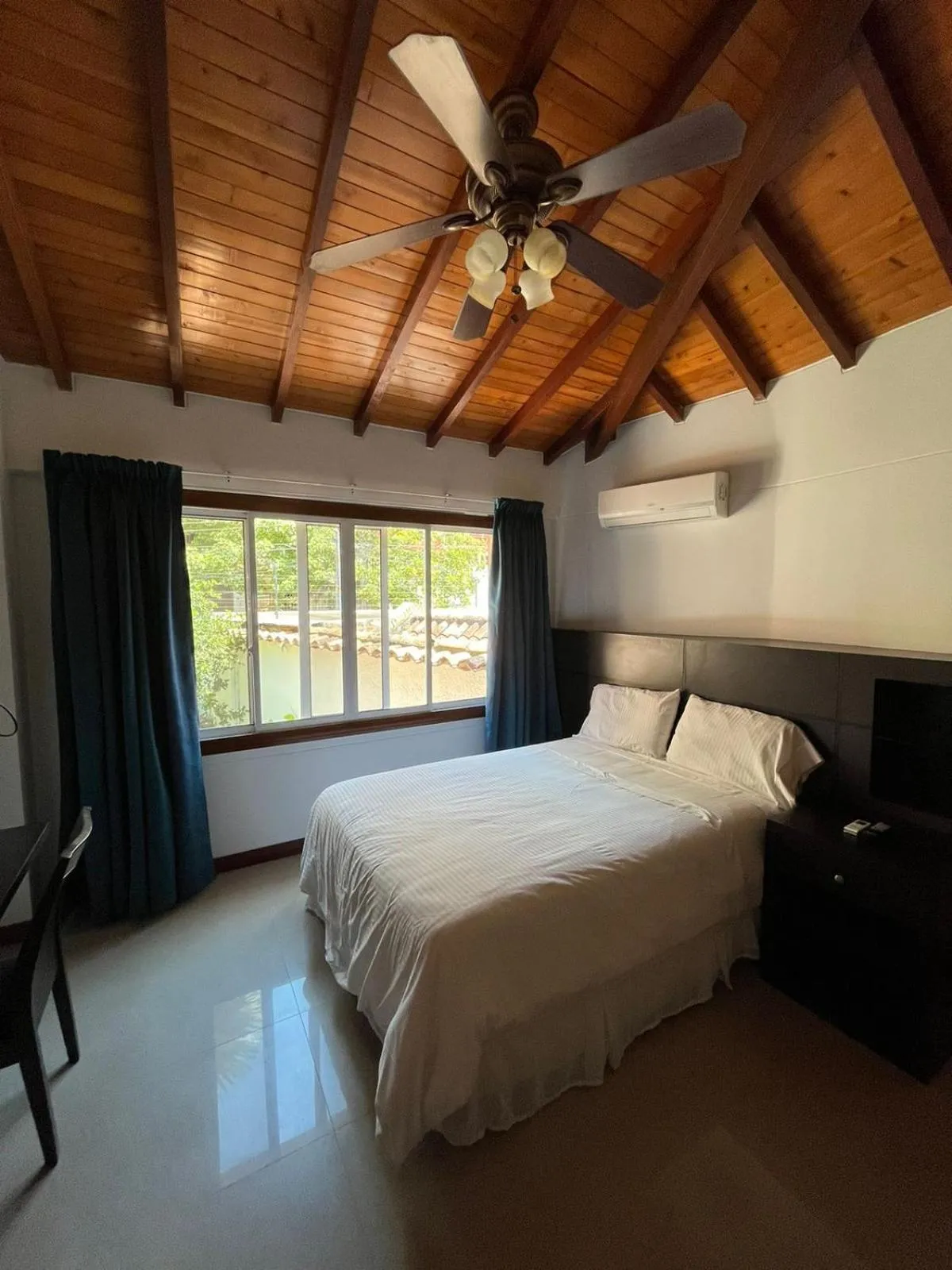 Bed in Serenity Suites Casa Boutique