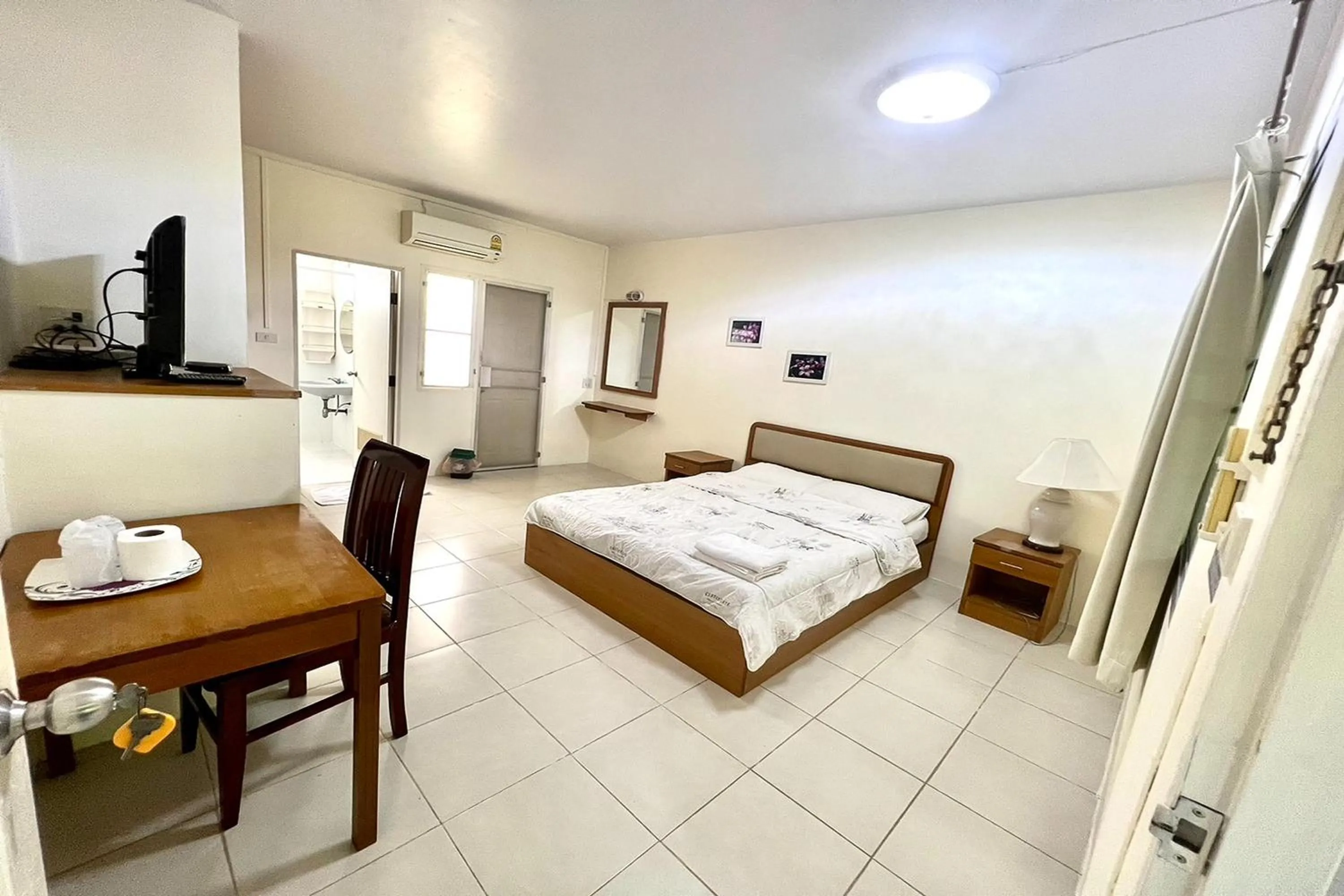 Bed in U.D.Home Apartment