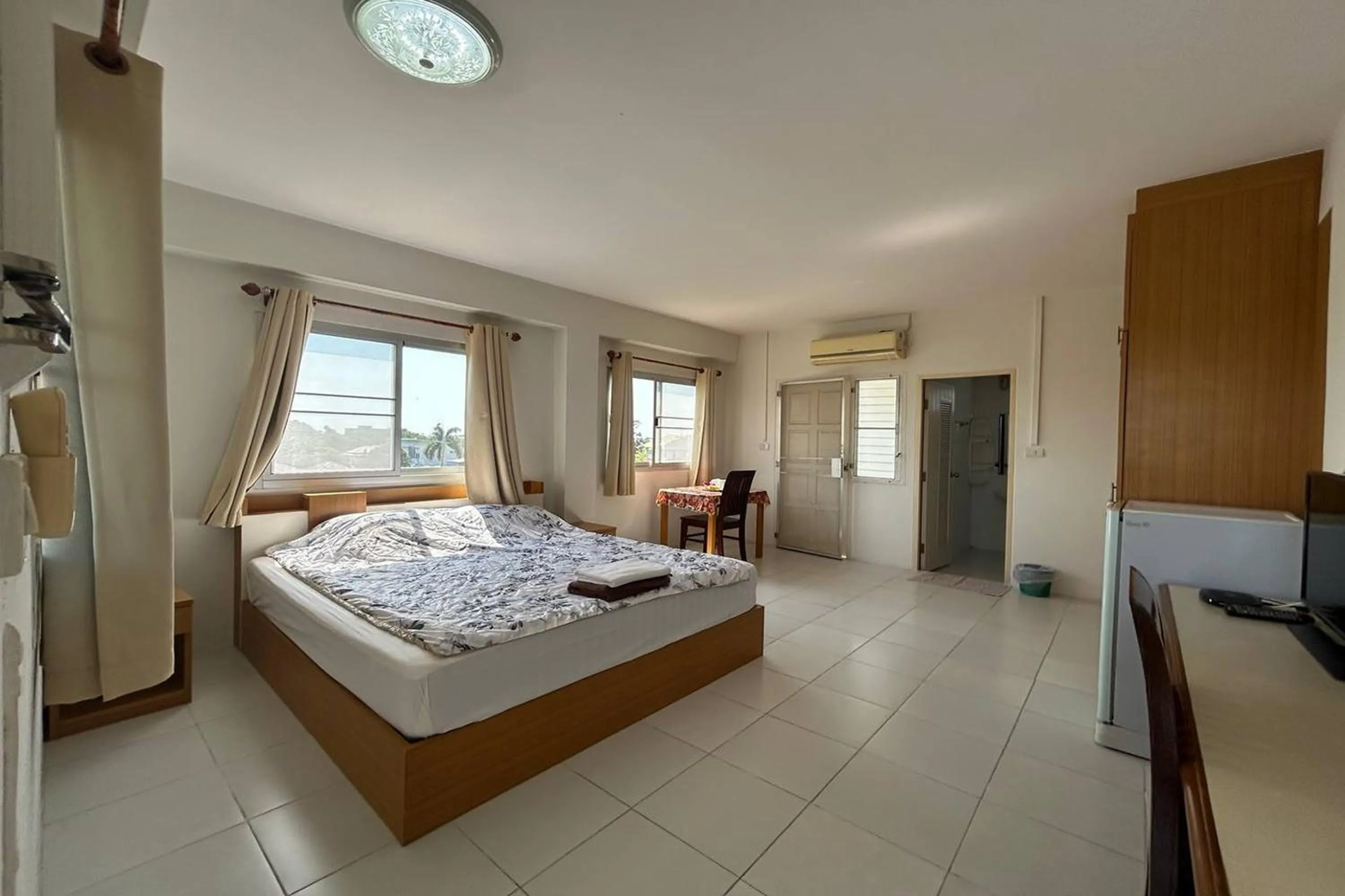 Bed in U.D.Home Apartment