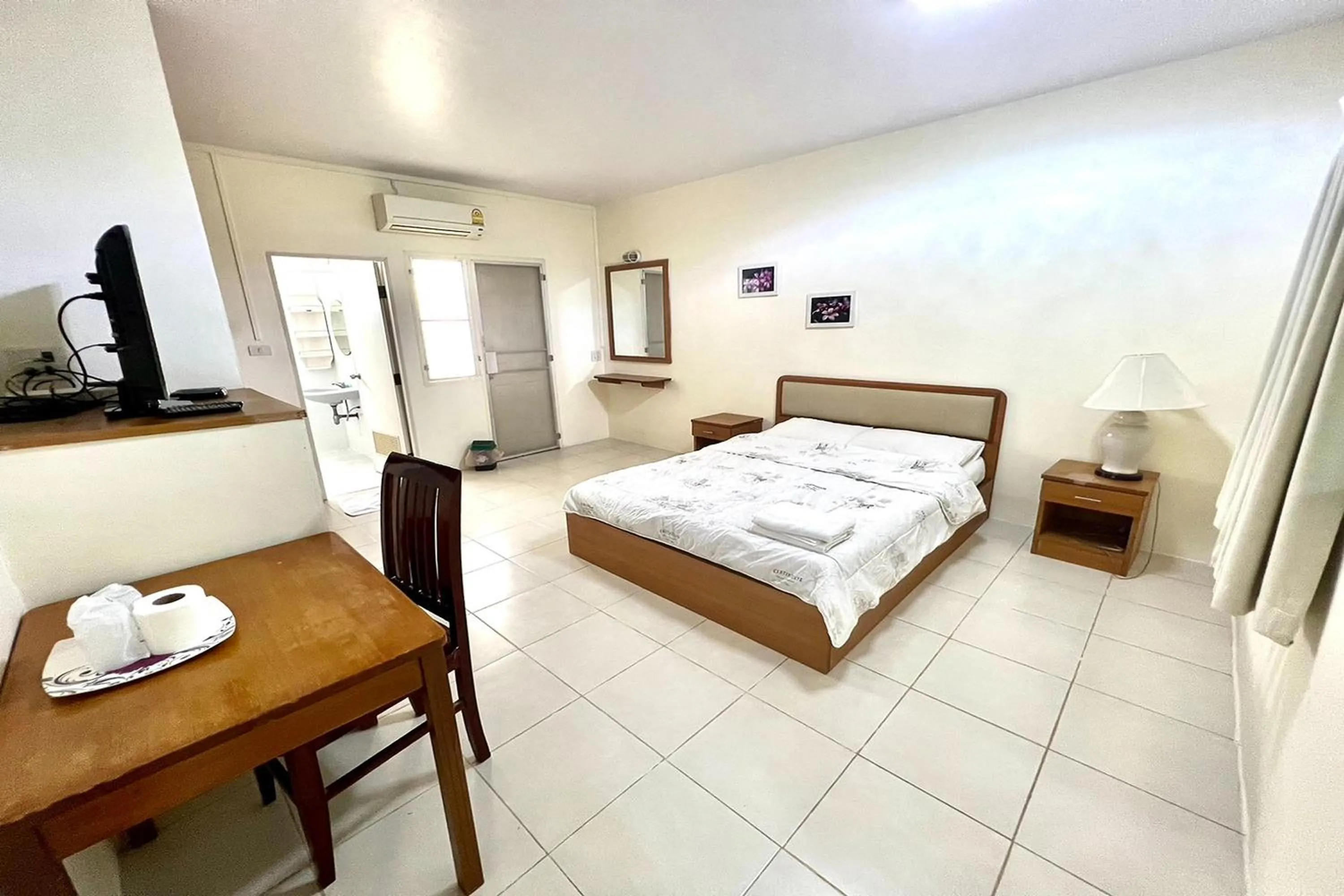 Bed in U.D.Home Apartment